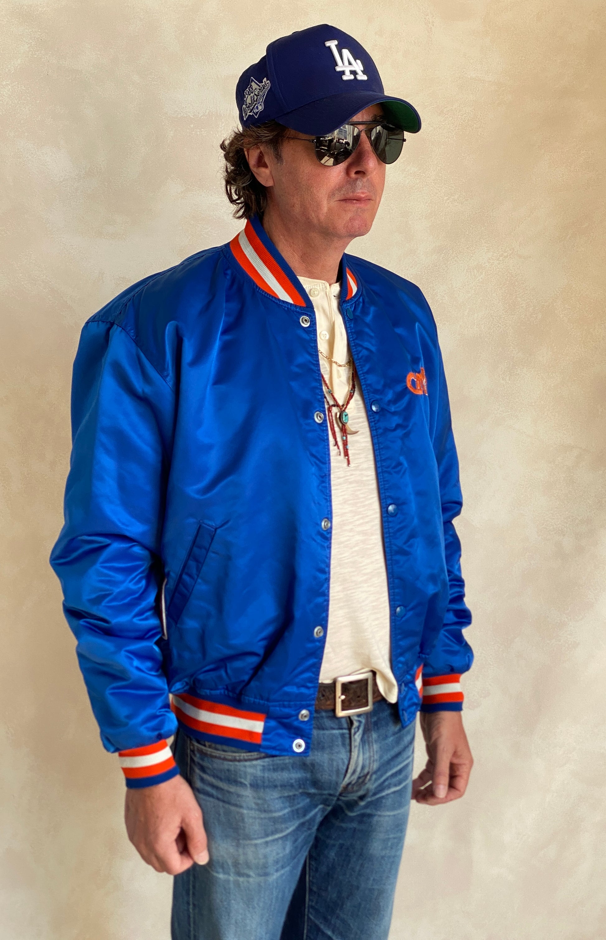 Vintage 1980s Cleveland Cavaliers Starter satin jacket with retro logo and bold team colors, size XL