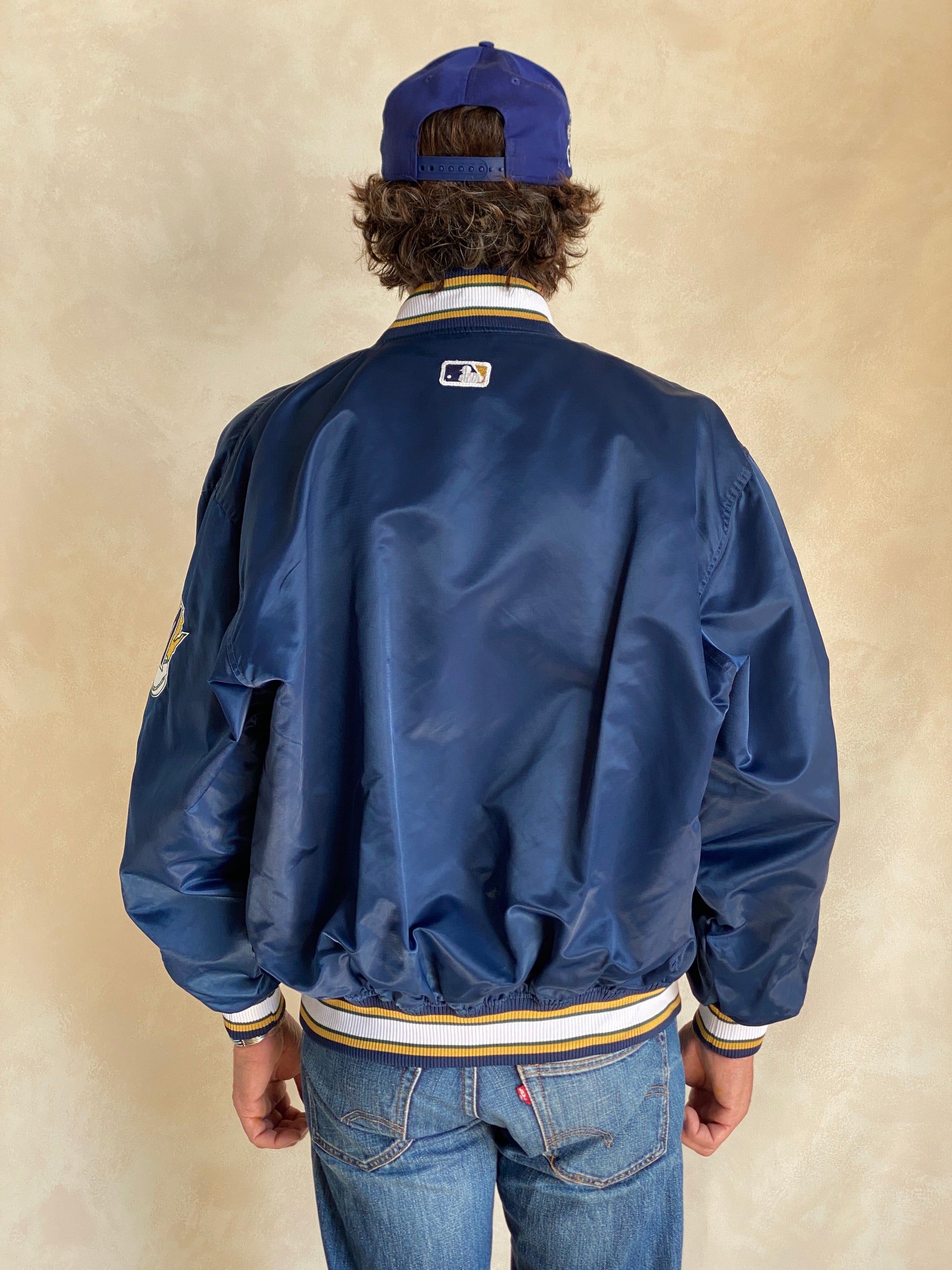 Vintage 1980s Milwaukee Brewers Starter satin jacket with team logo, size large