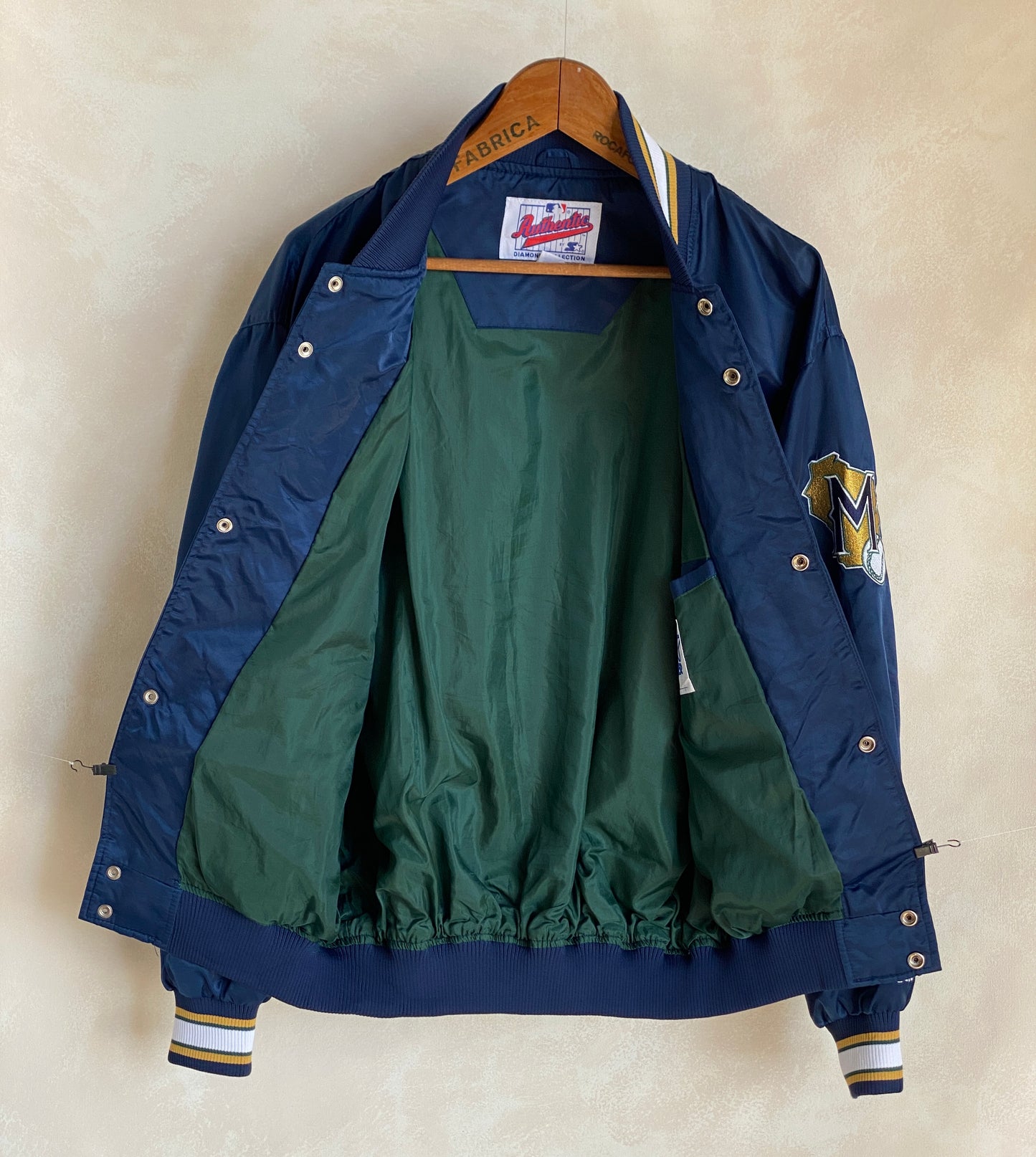Vintage 1980s Milwaukee Brewers Starter satin jacket with team logo, size large