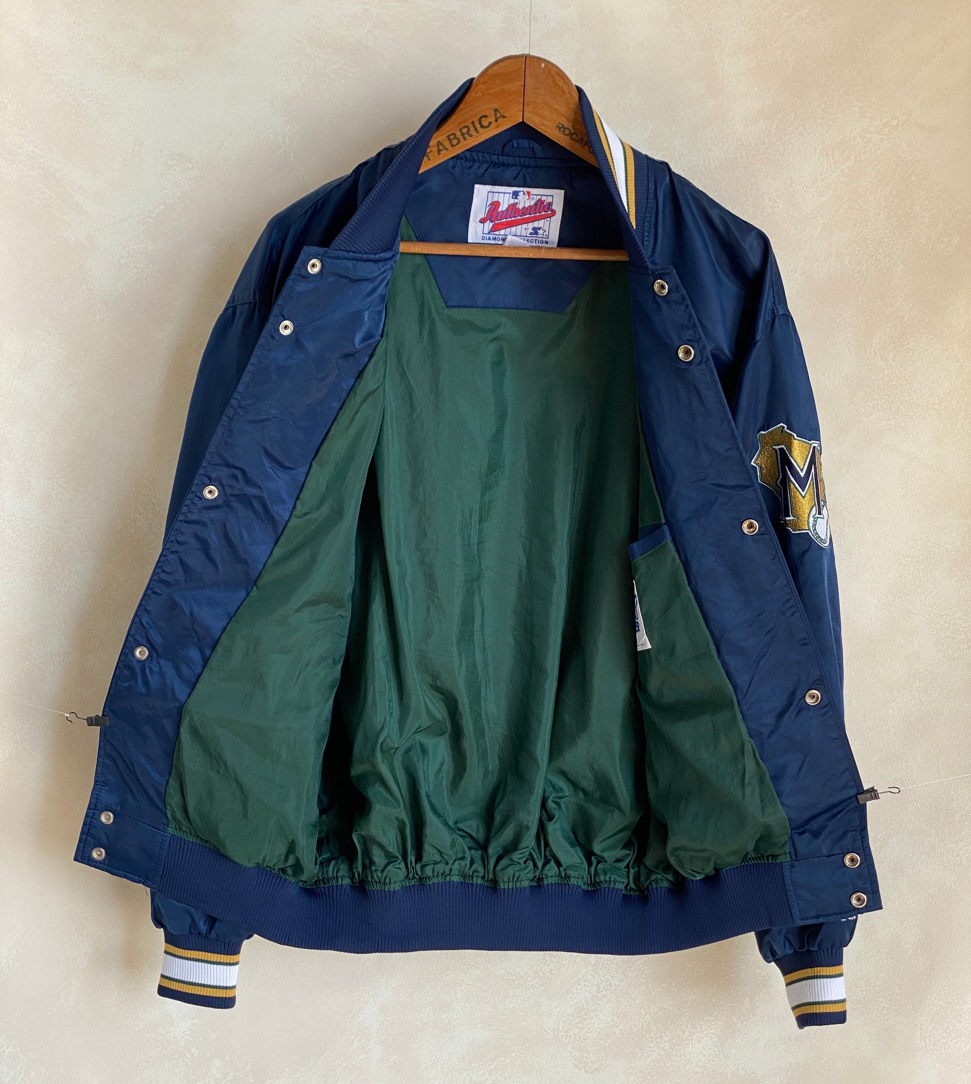Vintage 1980s Milwaukee Brewers Starter satin jacket with team logo, size large