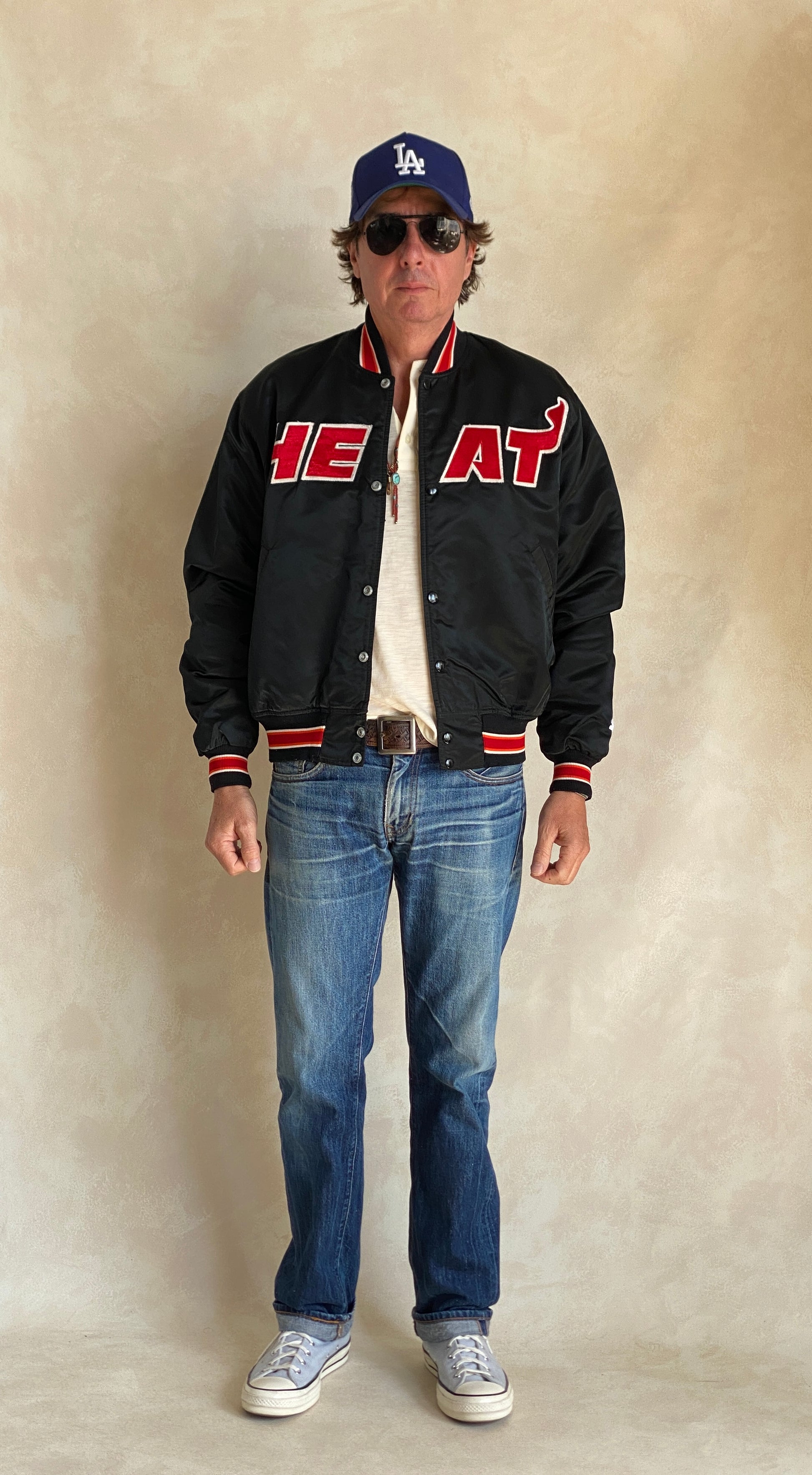 Vintage 1980s Miami Heat Starter satin jacket made in USA, size large.