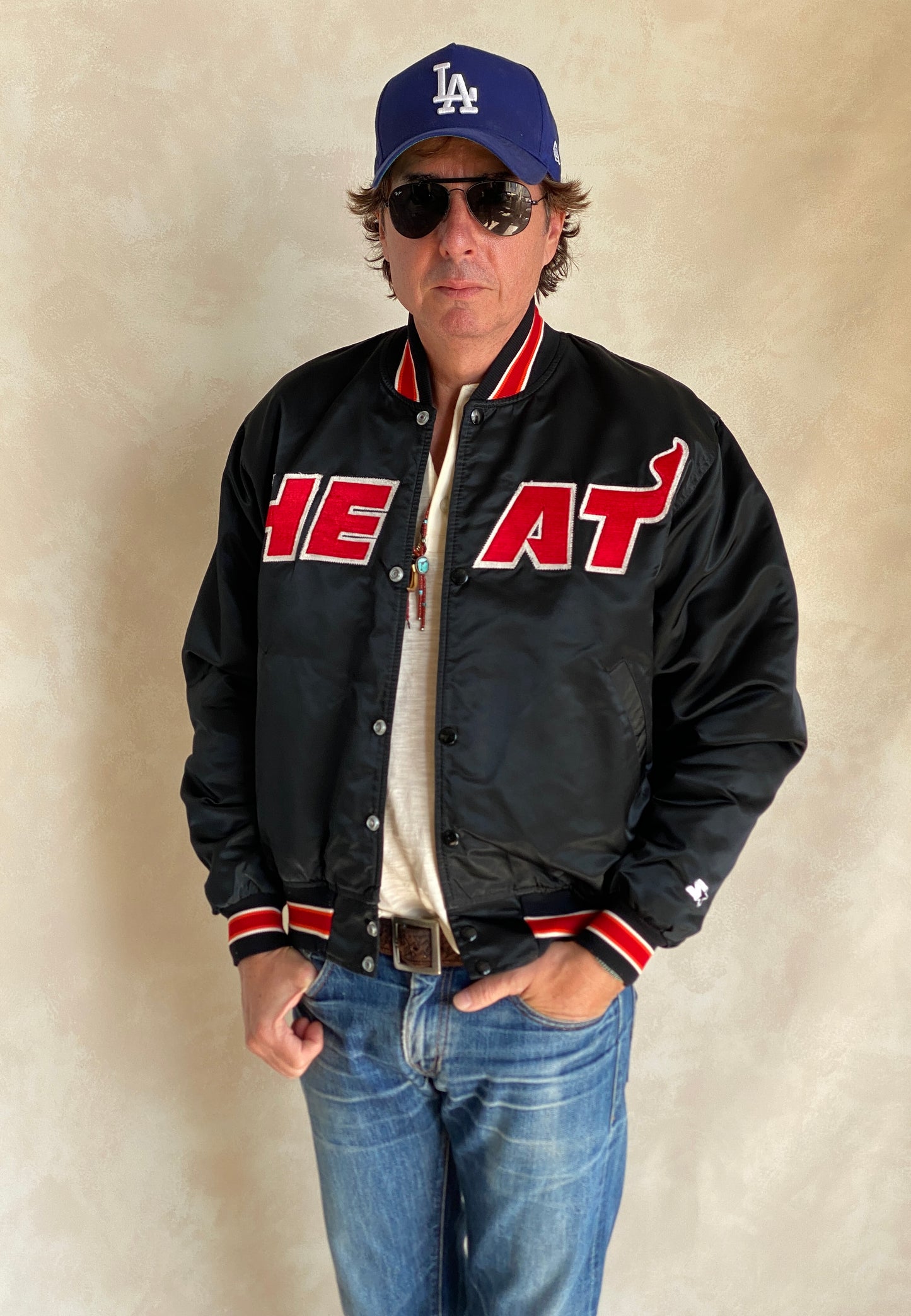Vintage 1980s Miami Heat Starter satin jacket made in USA, size large.
