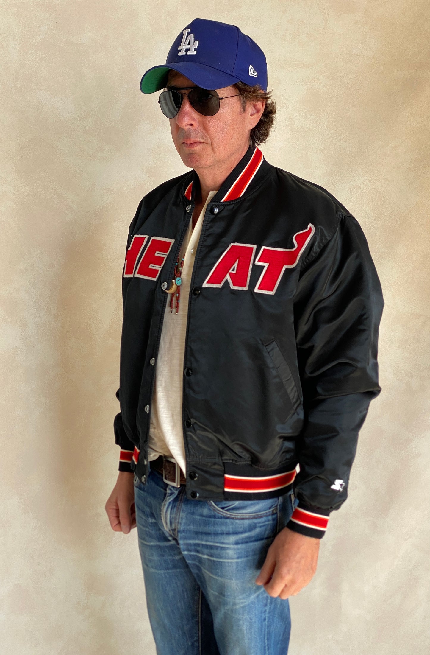 Vintage 1980s Miami Heat Starter satin jacket made in USA, size large.