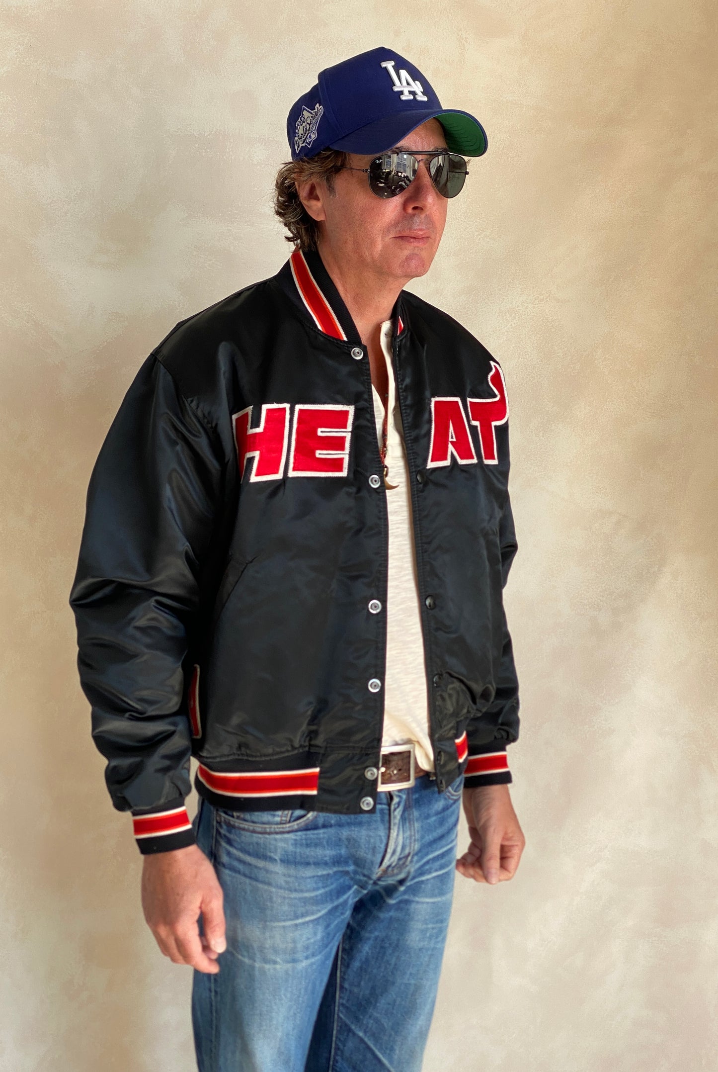 Vintage 1980s Miami Heat Starter satin jacket made in USA, size large.