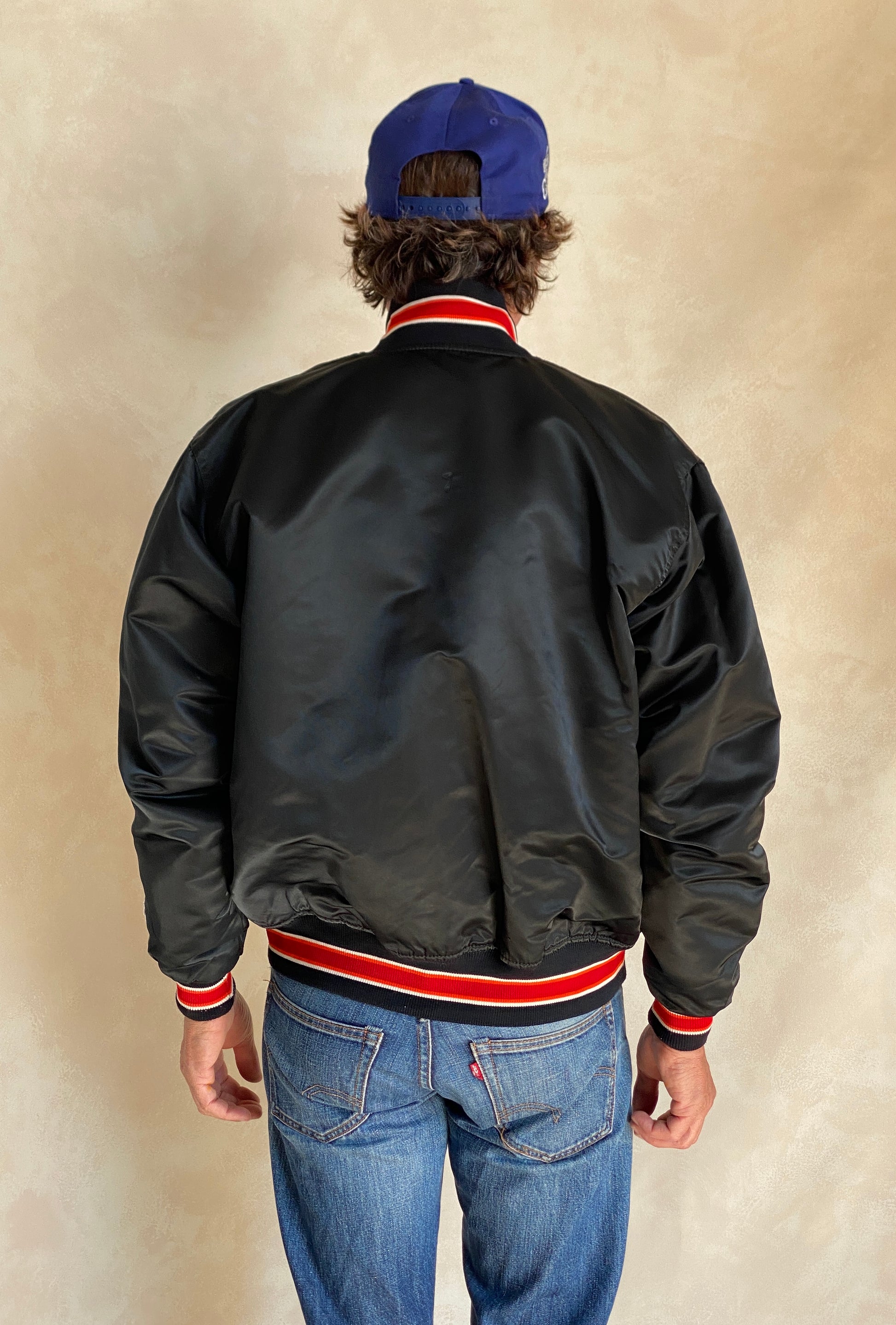 Vintage 1980s Miami Heat Starter satin jacket made in USA, size large.