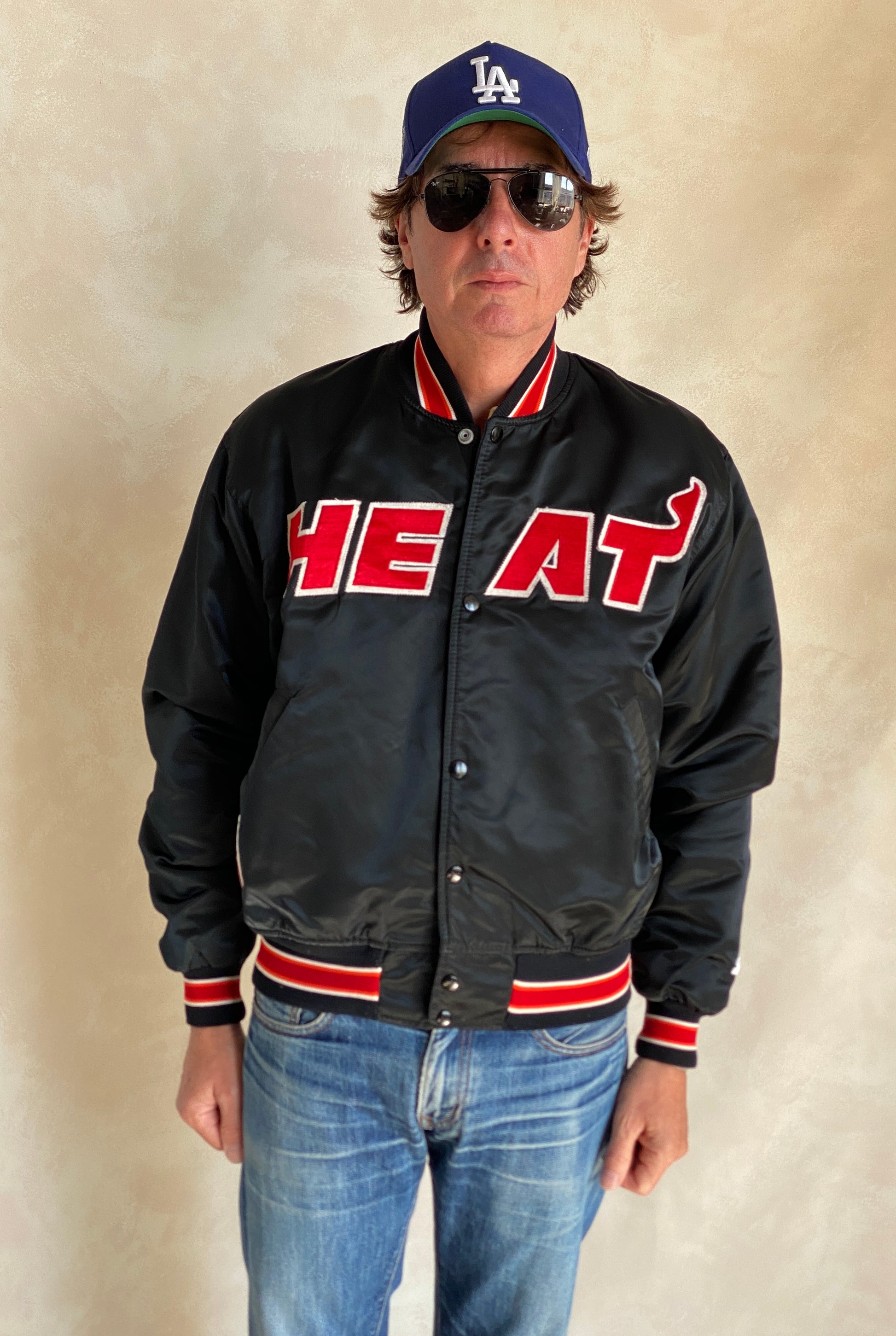Vintage 1980s Miami Heat Starter satin jacket made in USA, size large.