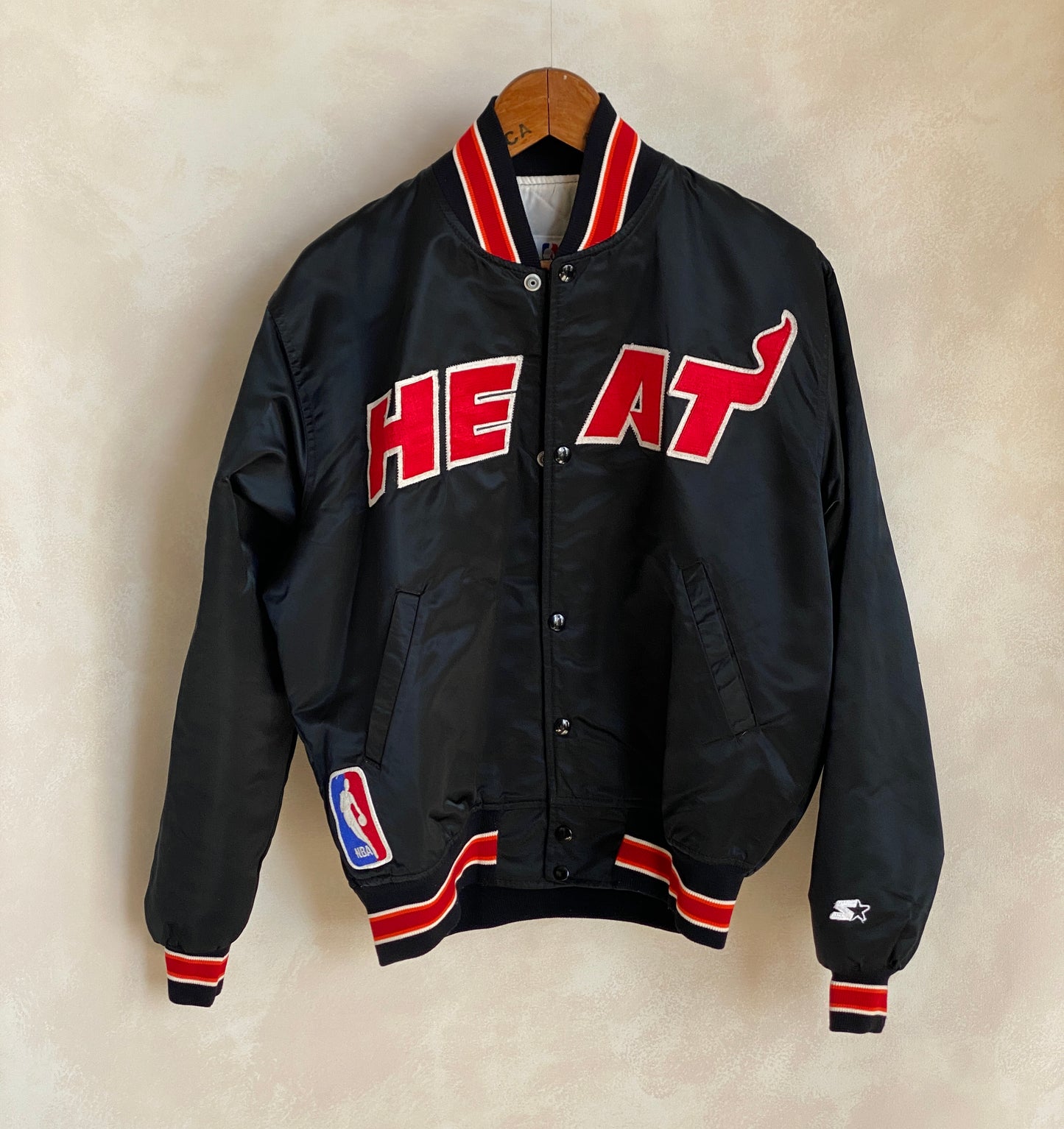 Vintage 1980s Miami Heat Starter satin jacket made in USA, size large.