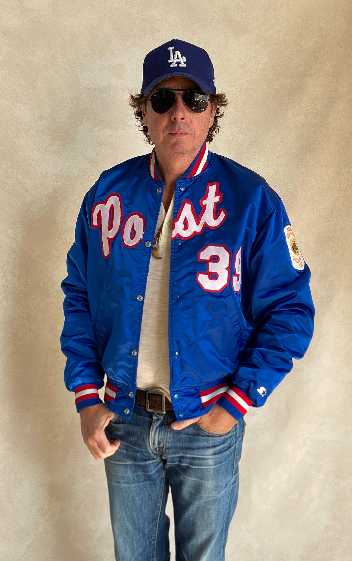 Vintage 1980s Post Starter satin jacket made in USA, size large.