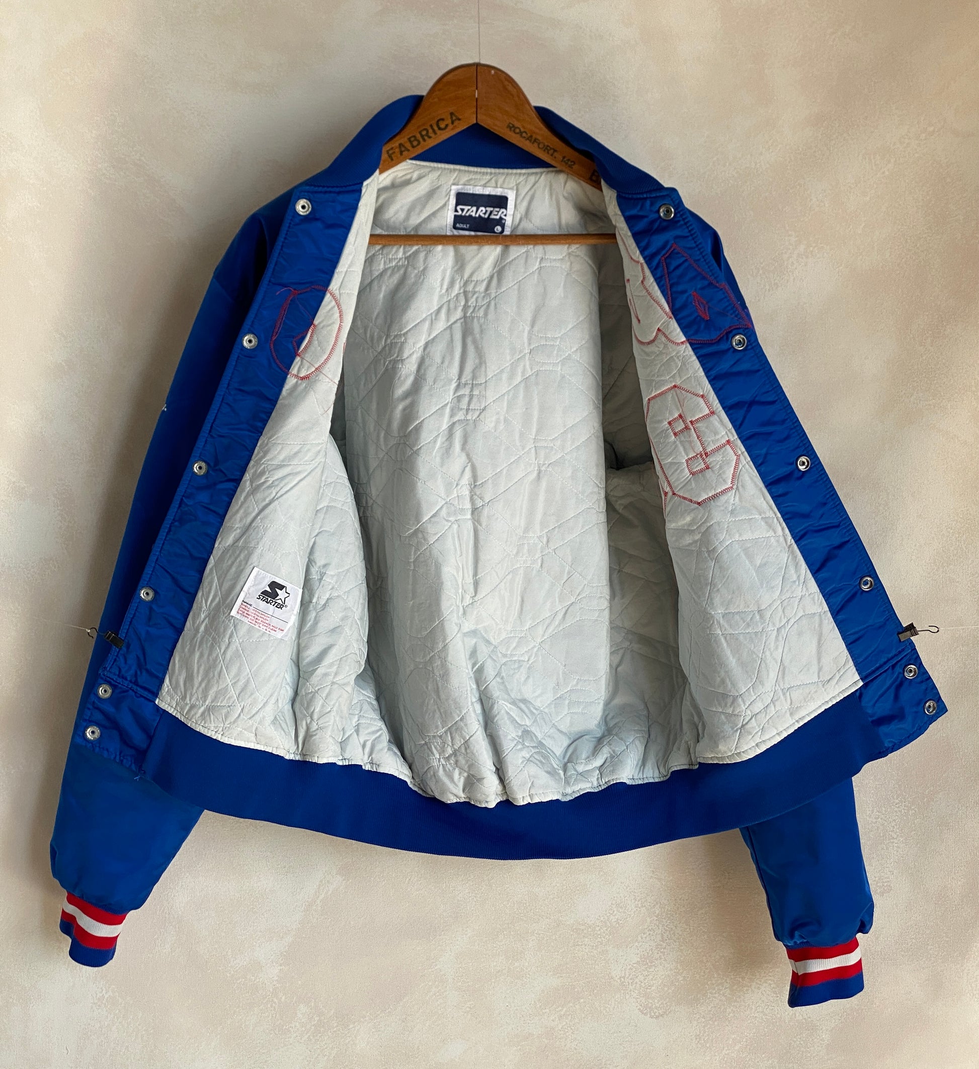 Vintage 1980s Post Starter satin jacket made in USA, size large.