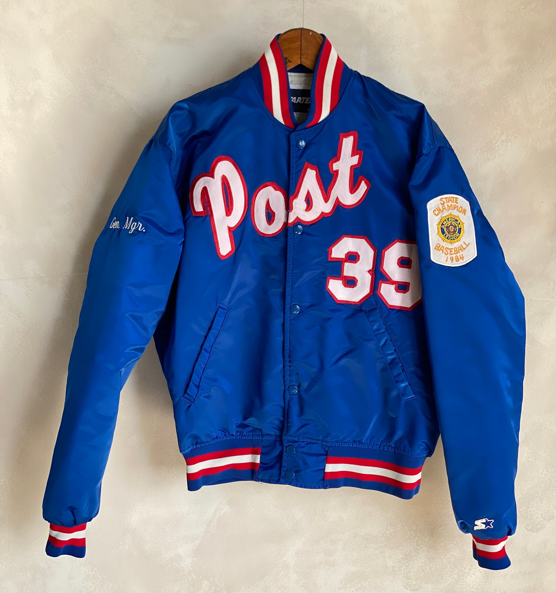 Vintage 1980s Post Starter satin jacket made in USA, size large.