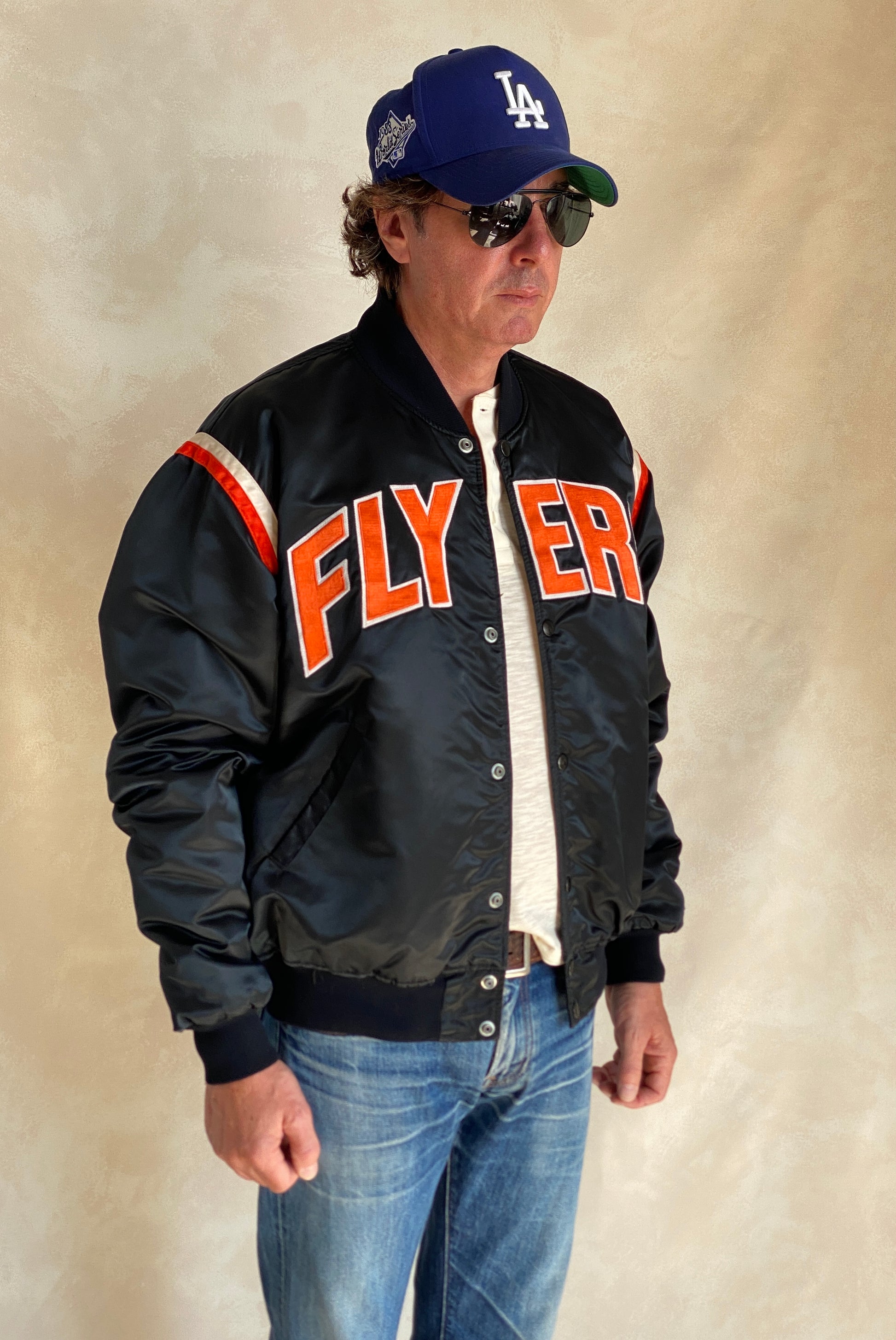 Vintage Philadelphia Flyers Starter satin jacket made in USA, size XLarge.