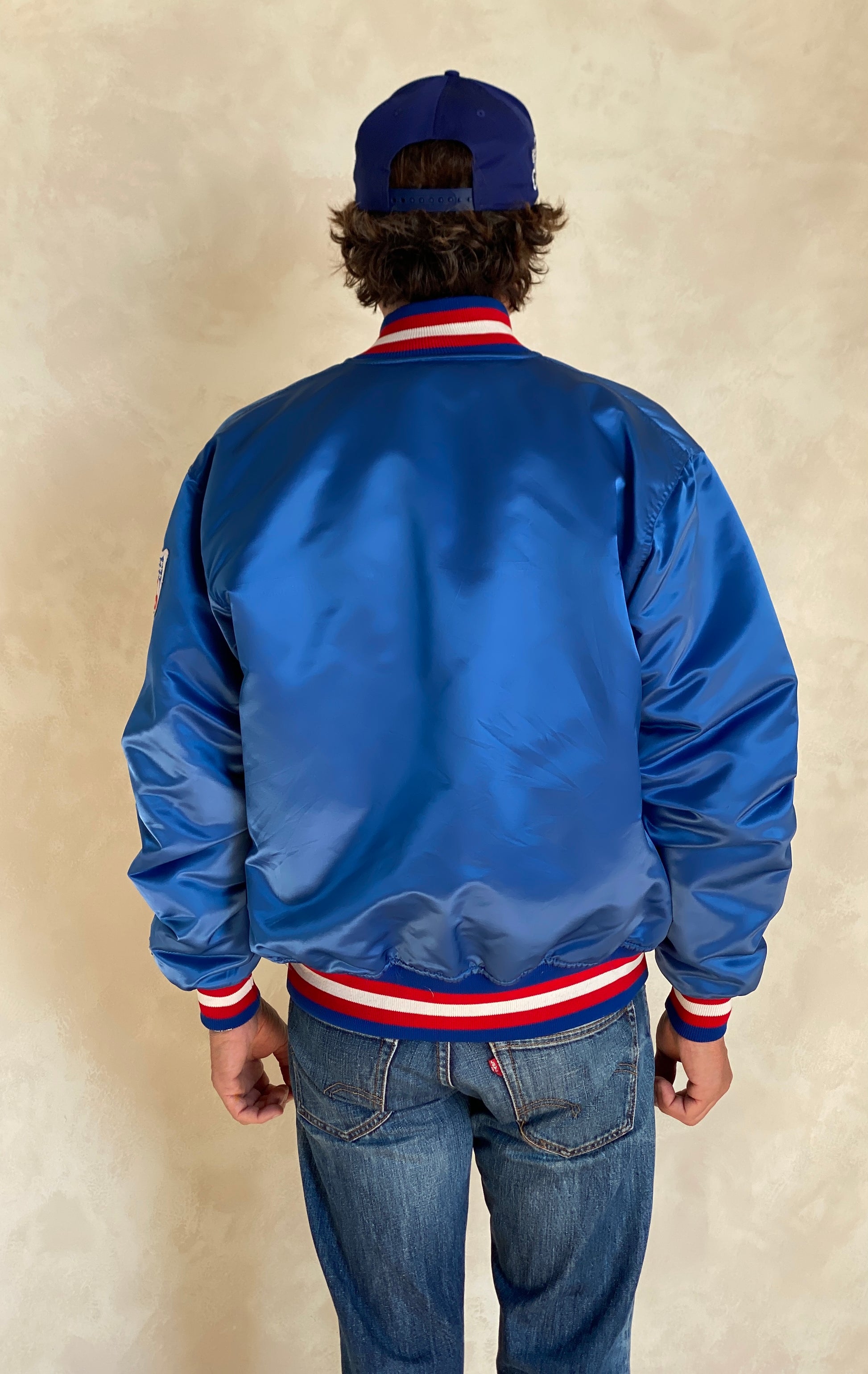 Vintage 1980s New England Patriots Starter satin jacket made in USA, size large.
