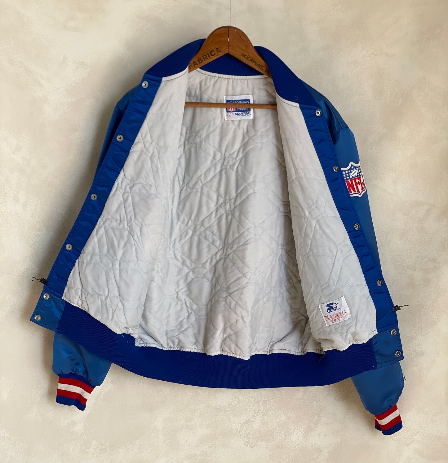 Vintage 1980s New England Patriots Starter satin jacket made in USA, size large.