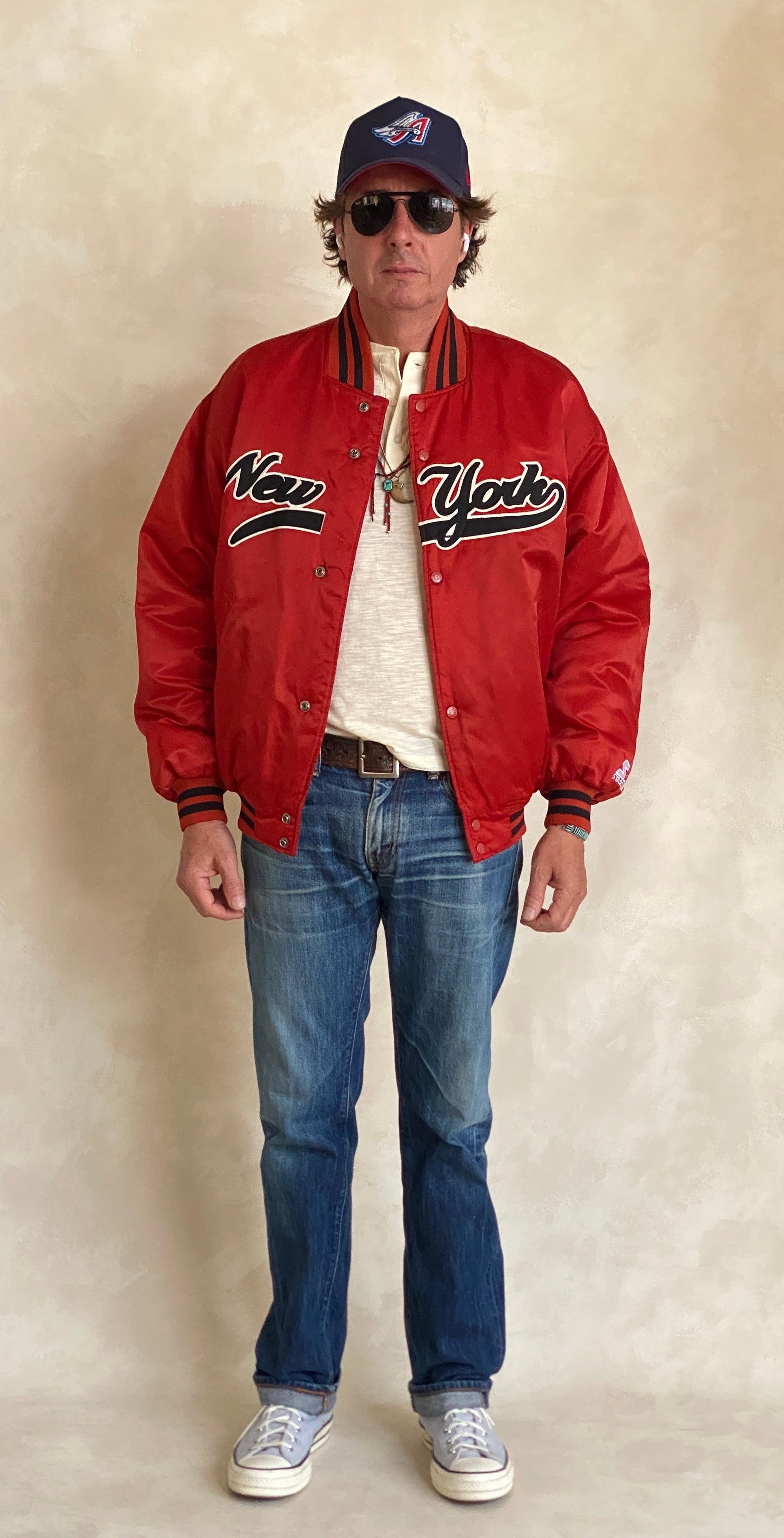 Vintage 1990s New York Starter satin jacket, classic sports style, size large.