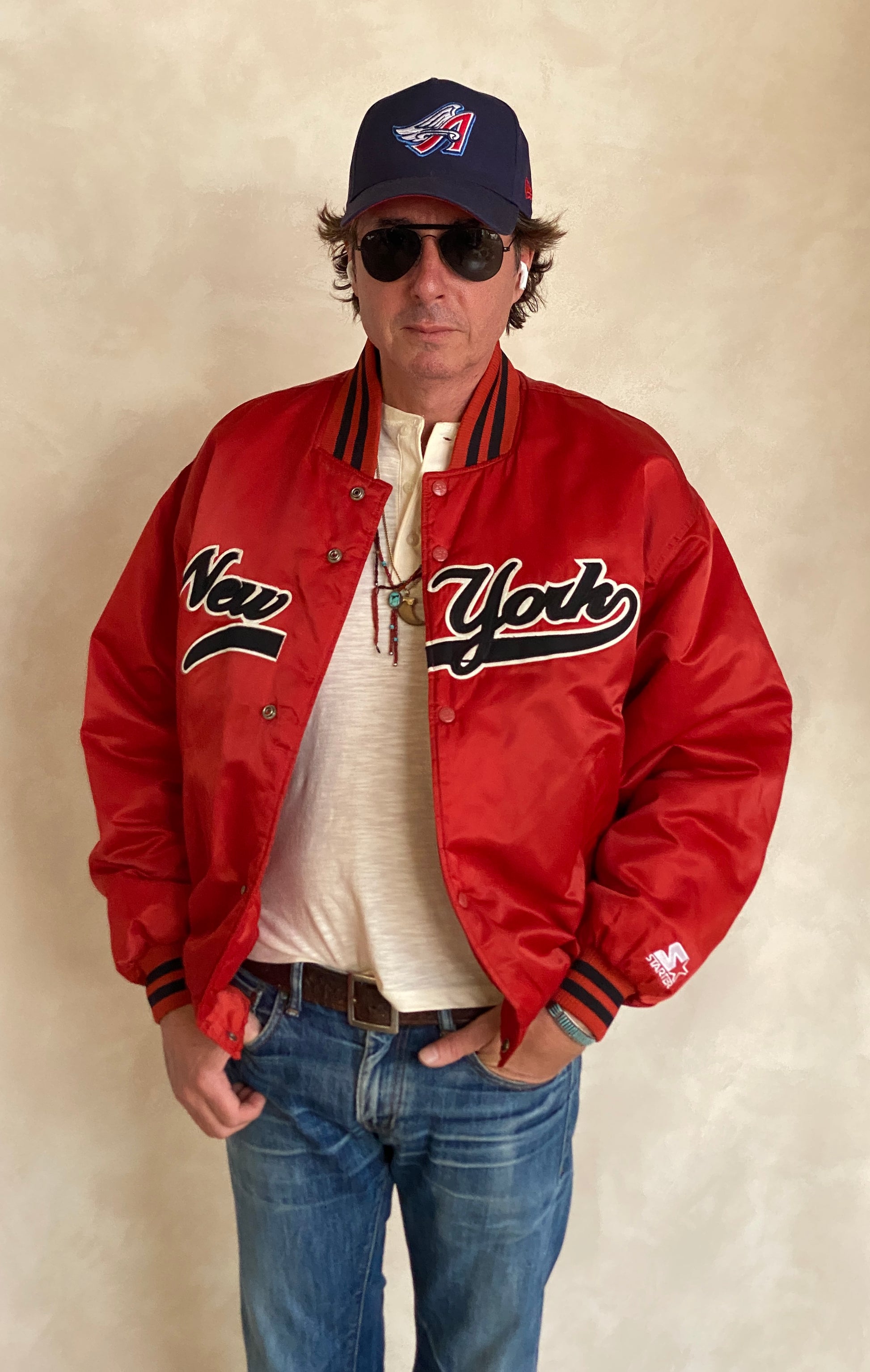 Vintage 1990s New York Starter satin jacket, classic sports style, size large.
