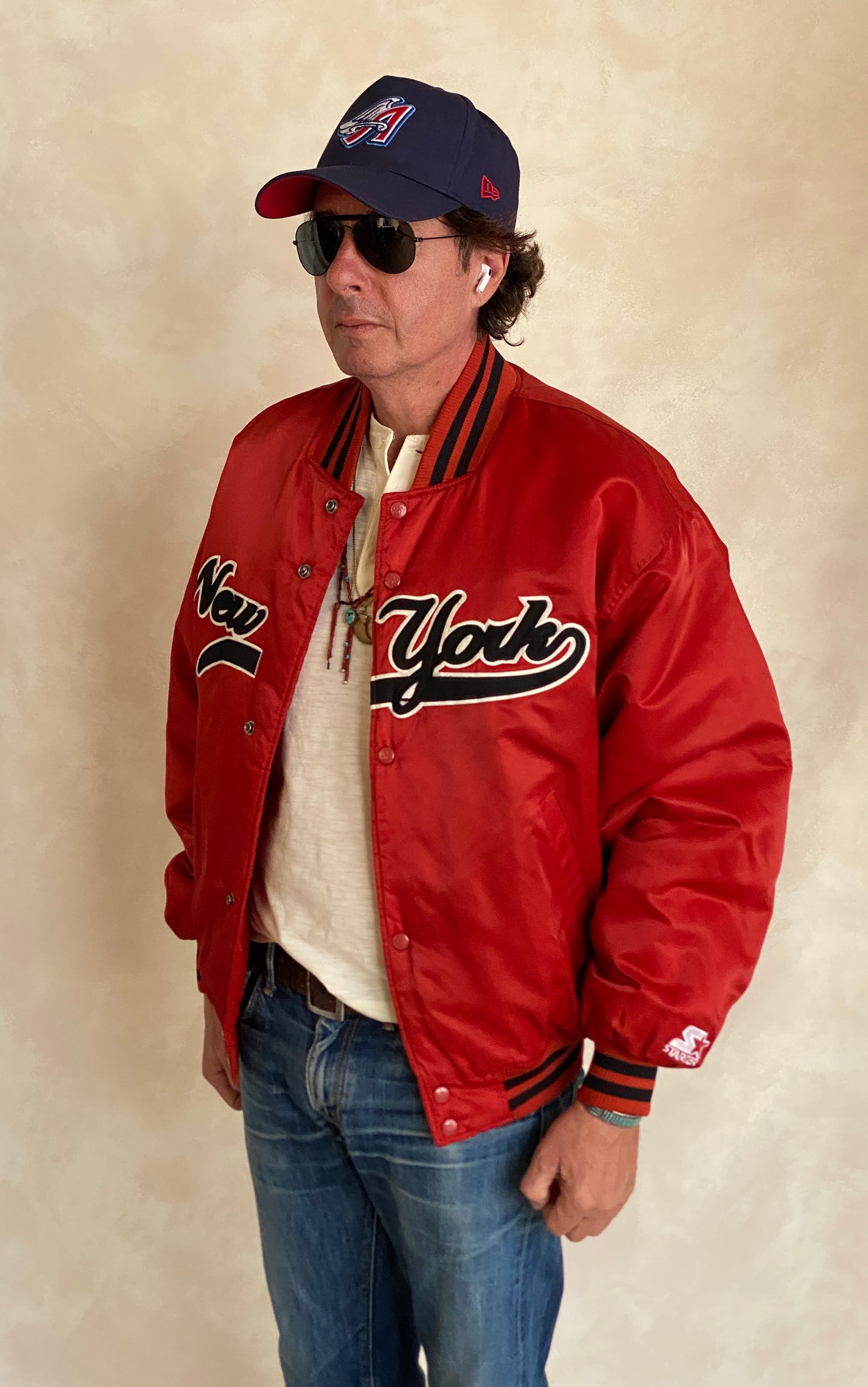 Vintage 1990s New York Starter satin jacket, classic sports style, size large.