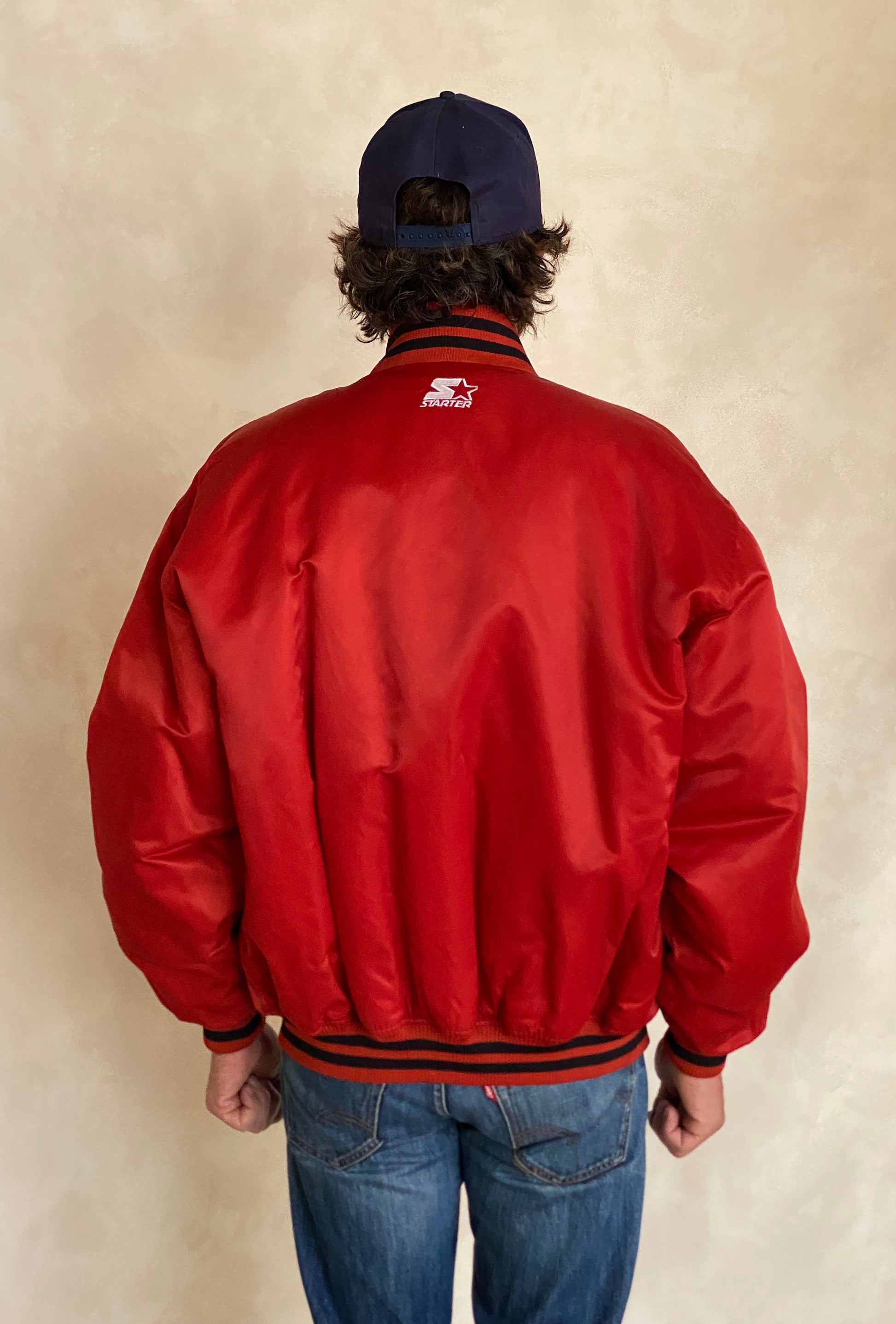 Vintage 1990s New York Starter satin jacket, classic sports style, size large.