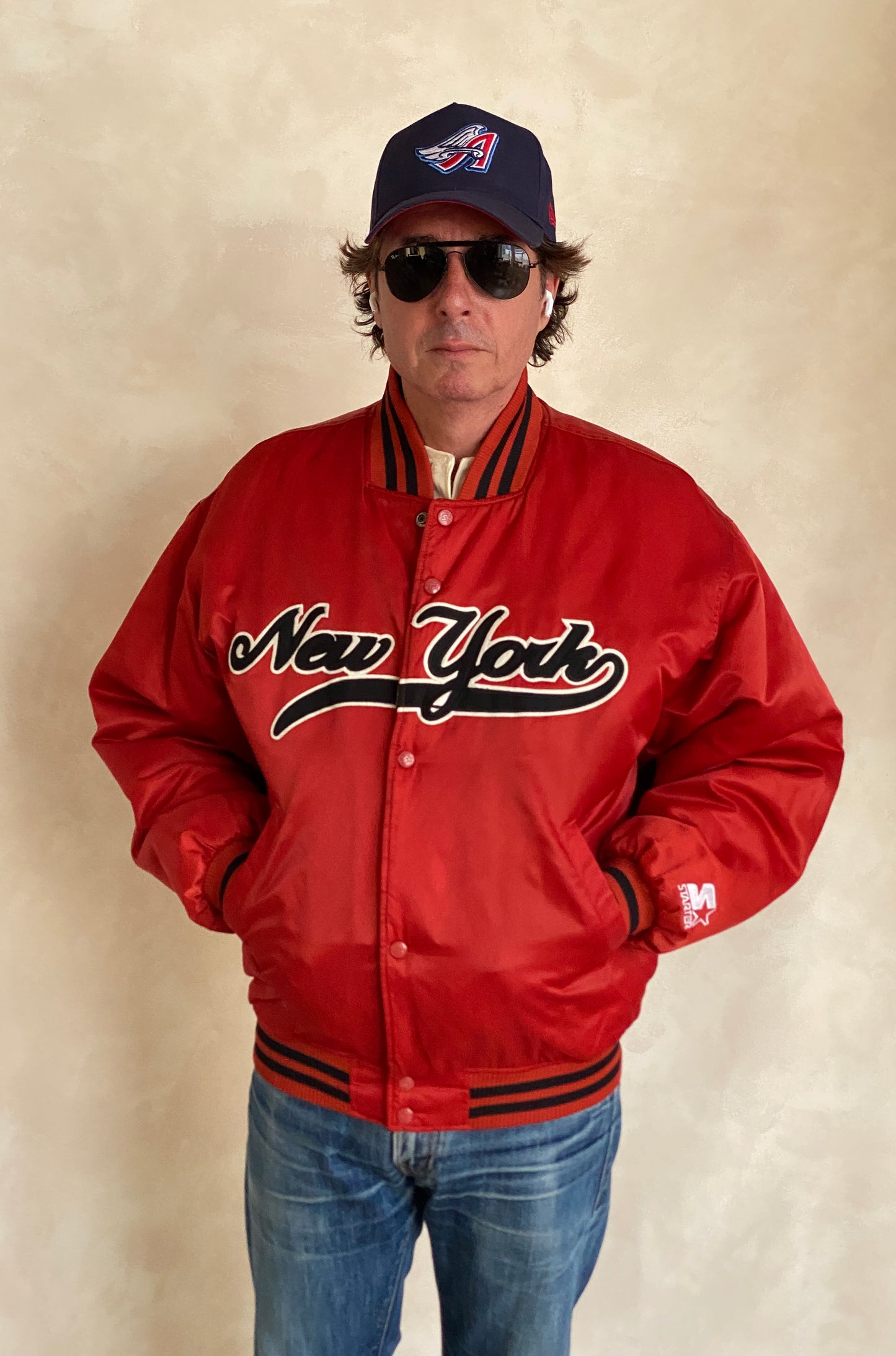 Vintage 1990s New York Starter satin jacket, classic sports style, size large.