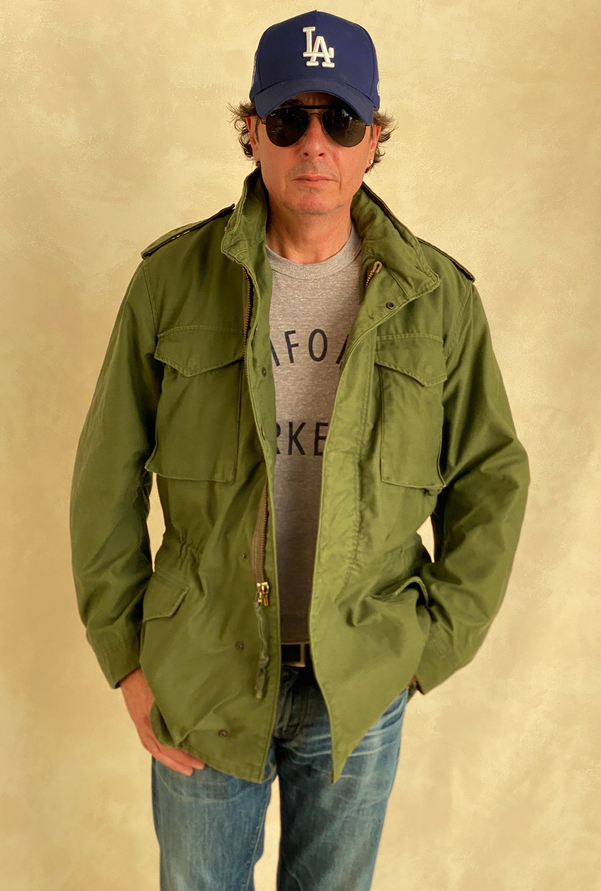 Authentic vintage US Army M-65 OG-107 field jacket, olive drab, size Medium Long.