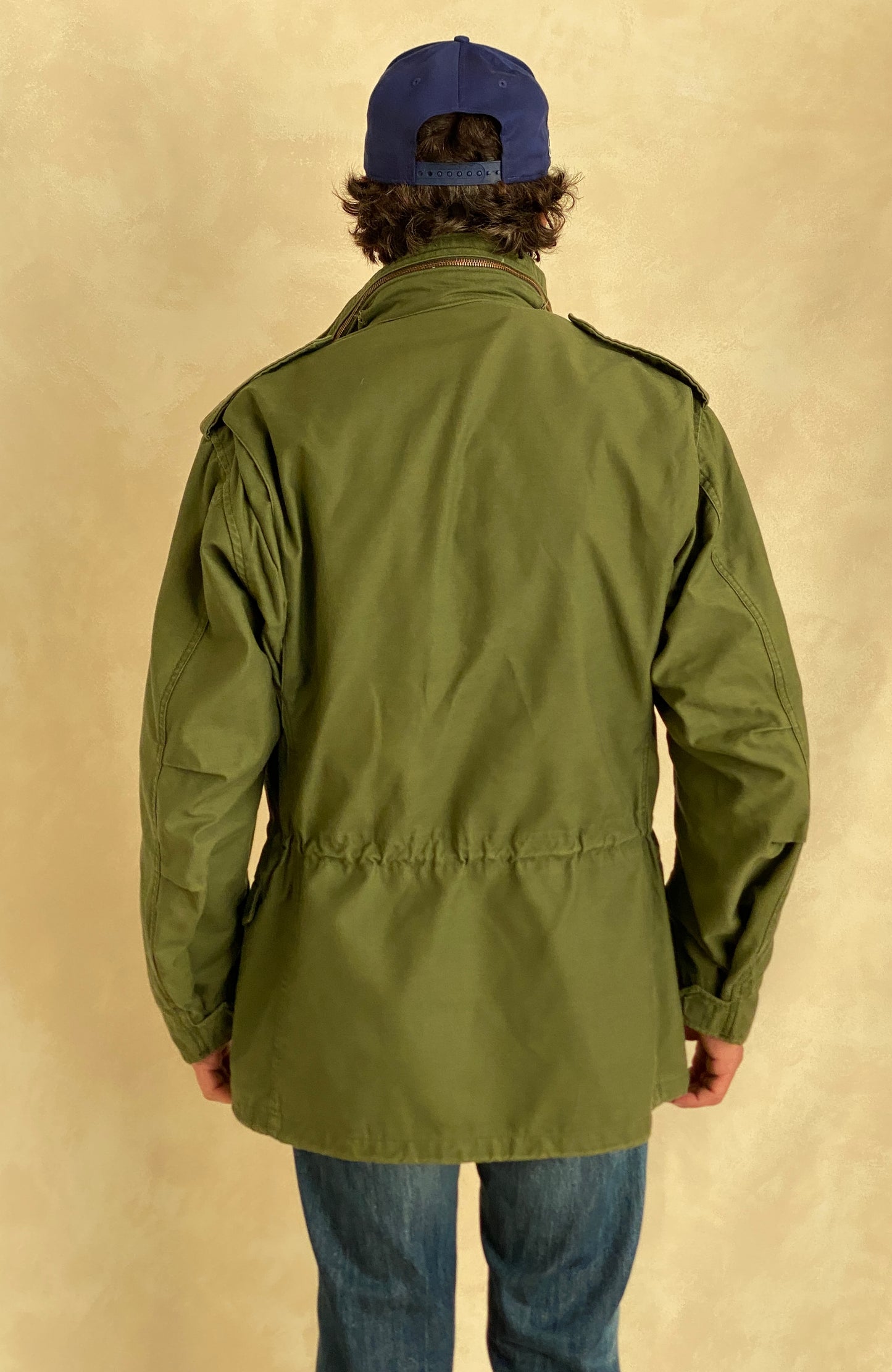 Authentic vintage US Army M-65 OG-107 field jacket, olive drab, size Medium Long.