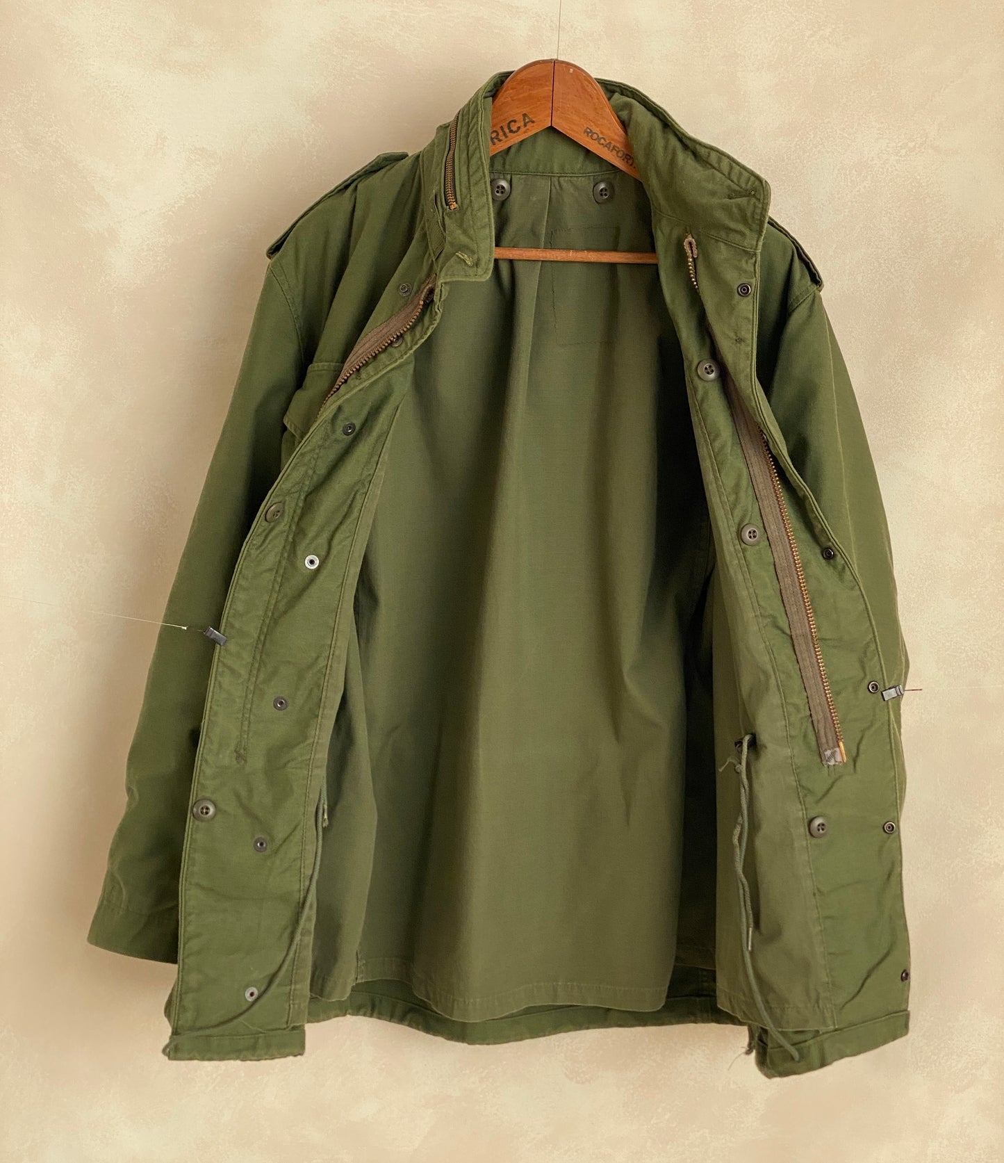 Authentic vintage US Army M-65 OG-107 field jacket, olive drab, size Medium Long.