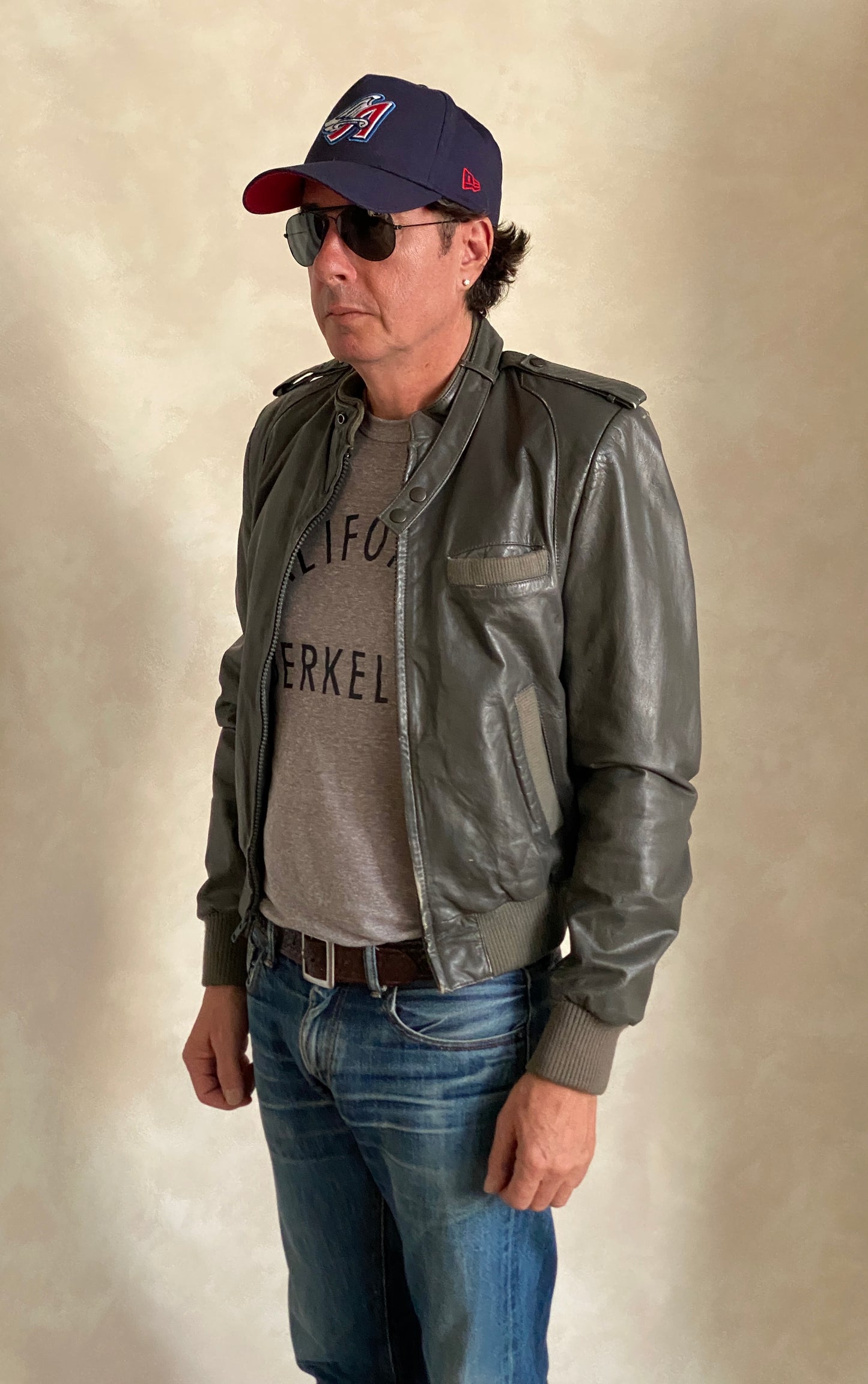 Vintage 1980s leather jacket in retro fashion style, size 38US 48EU
