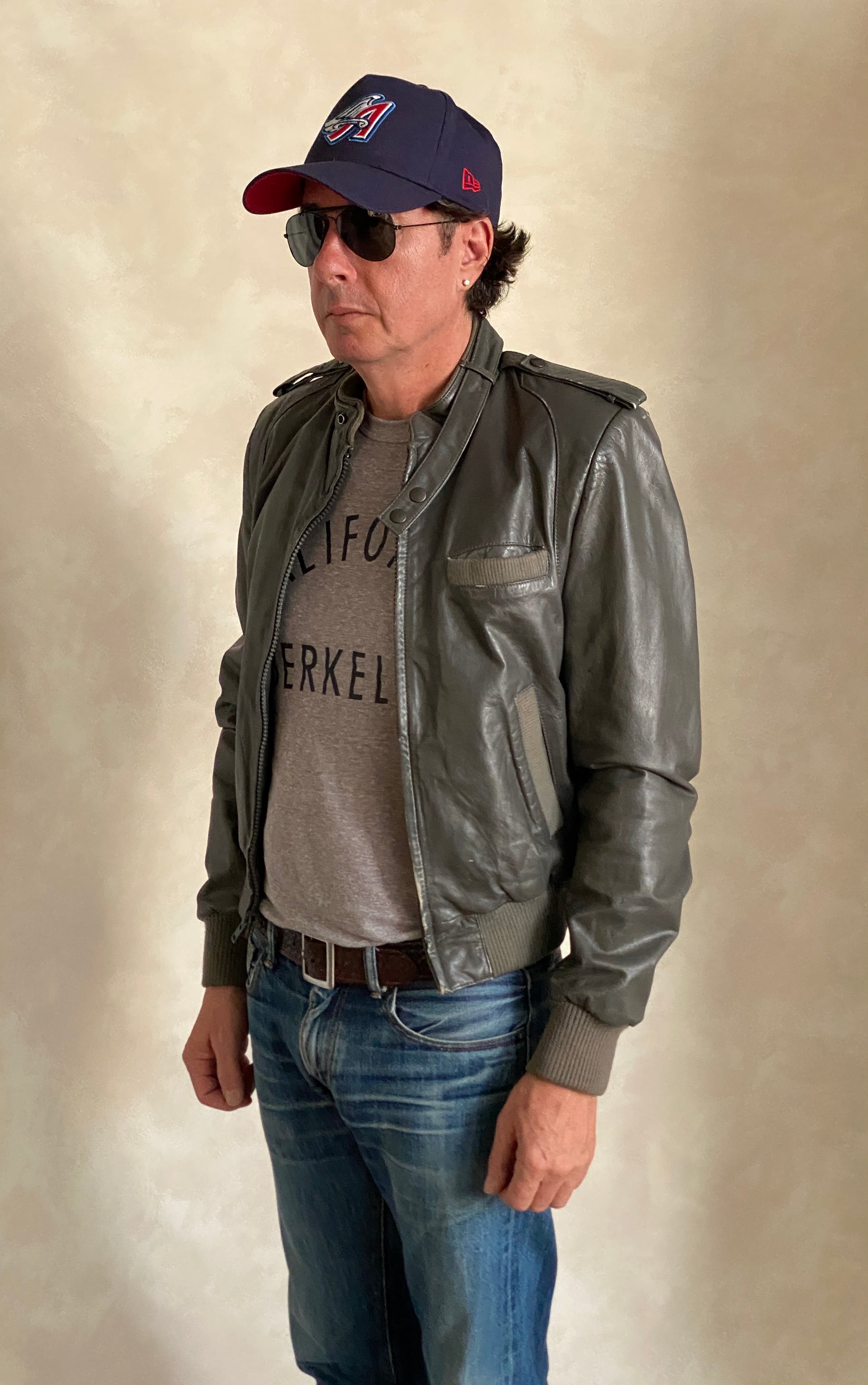 Vintage 1980s leather jacket in retro fashion style, size 38US 48EU