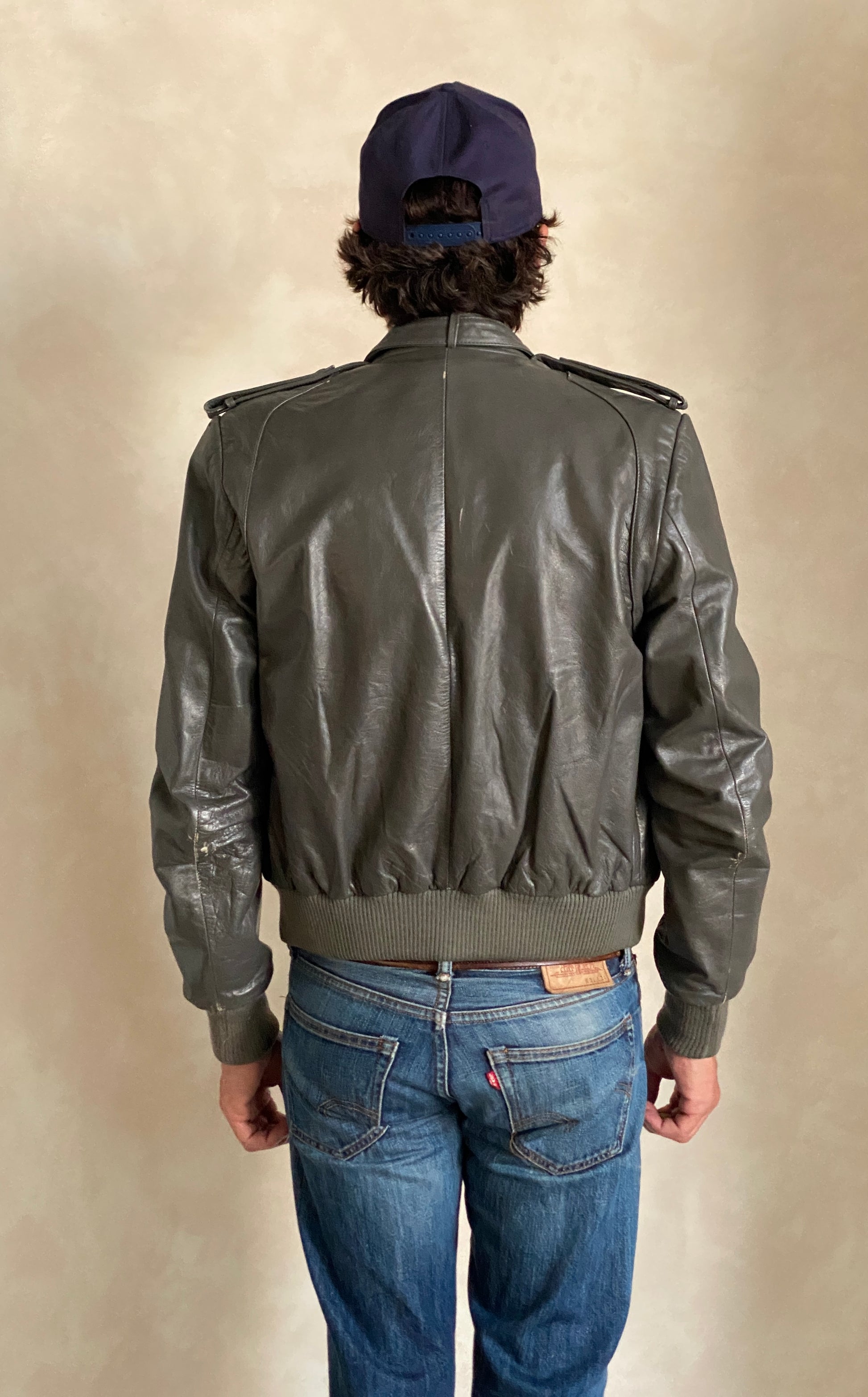Vintage 1980s leather jacket in retro fashion style, size 38US 48EU