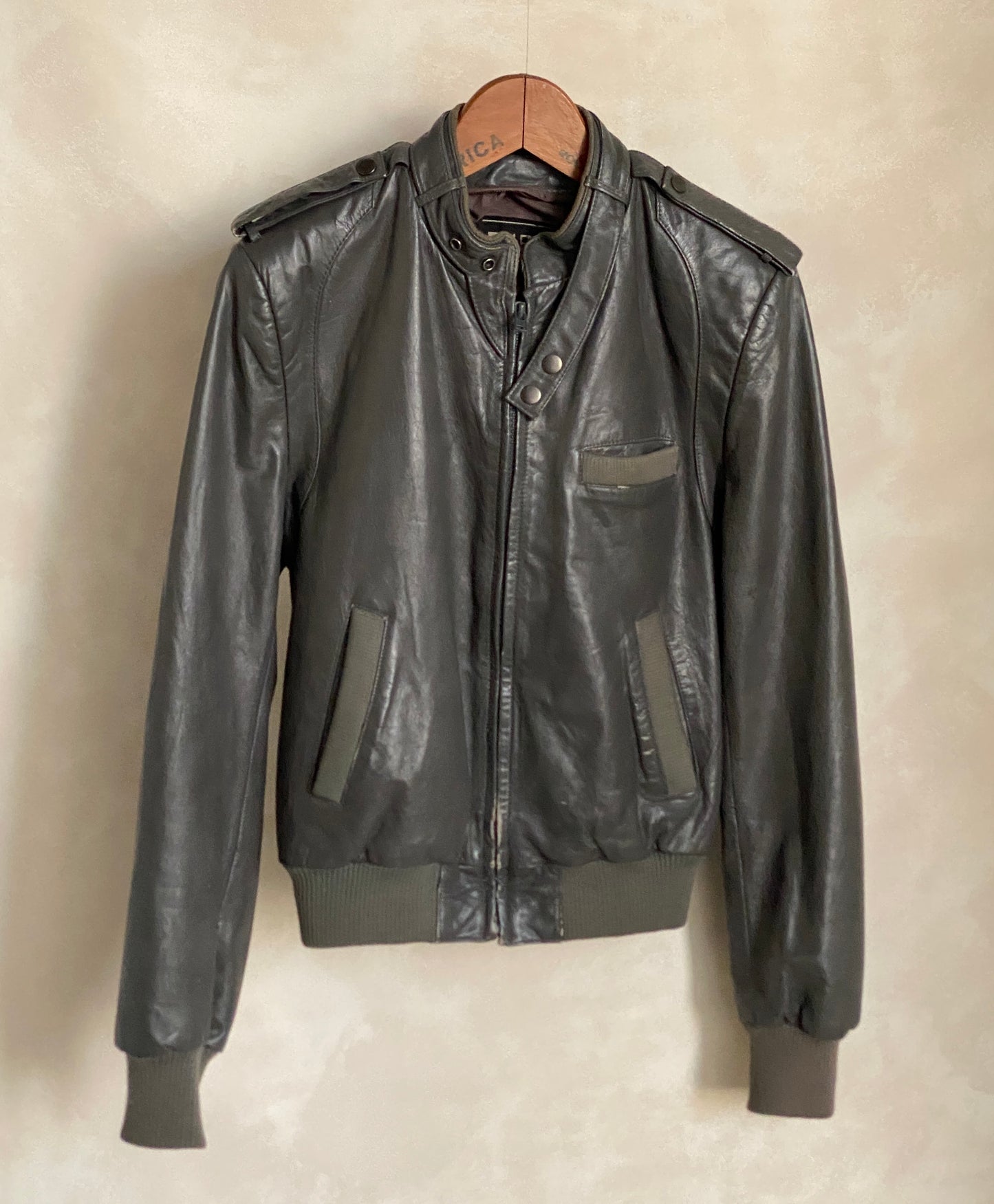 Vintage 1980s leather jacket in retro fashion style, size 38US 48EU