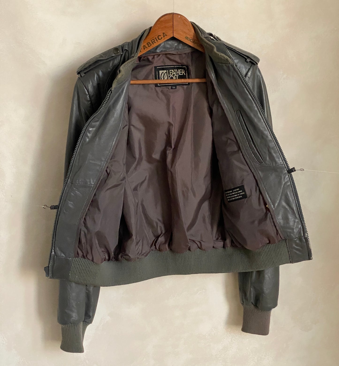 Vintage 1980s leather jacket in retro fashion style, size 38US 48EU