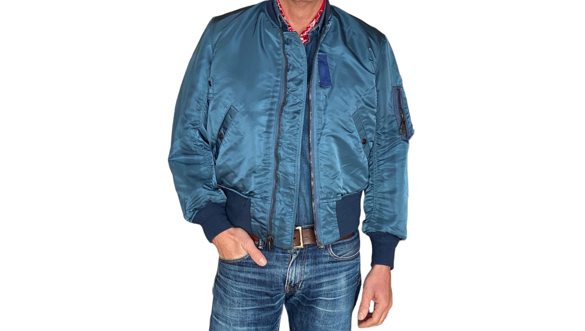 Vintage MA-1 flight bomber jacket by Weintraub Brothers, nylon shell with orange lining, size Small.