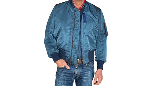 Vintage MA-1 flight bomber jacket by Weintraub Brothers, nylon shell with orange lining, size Small.