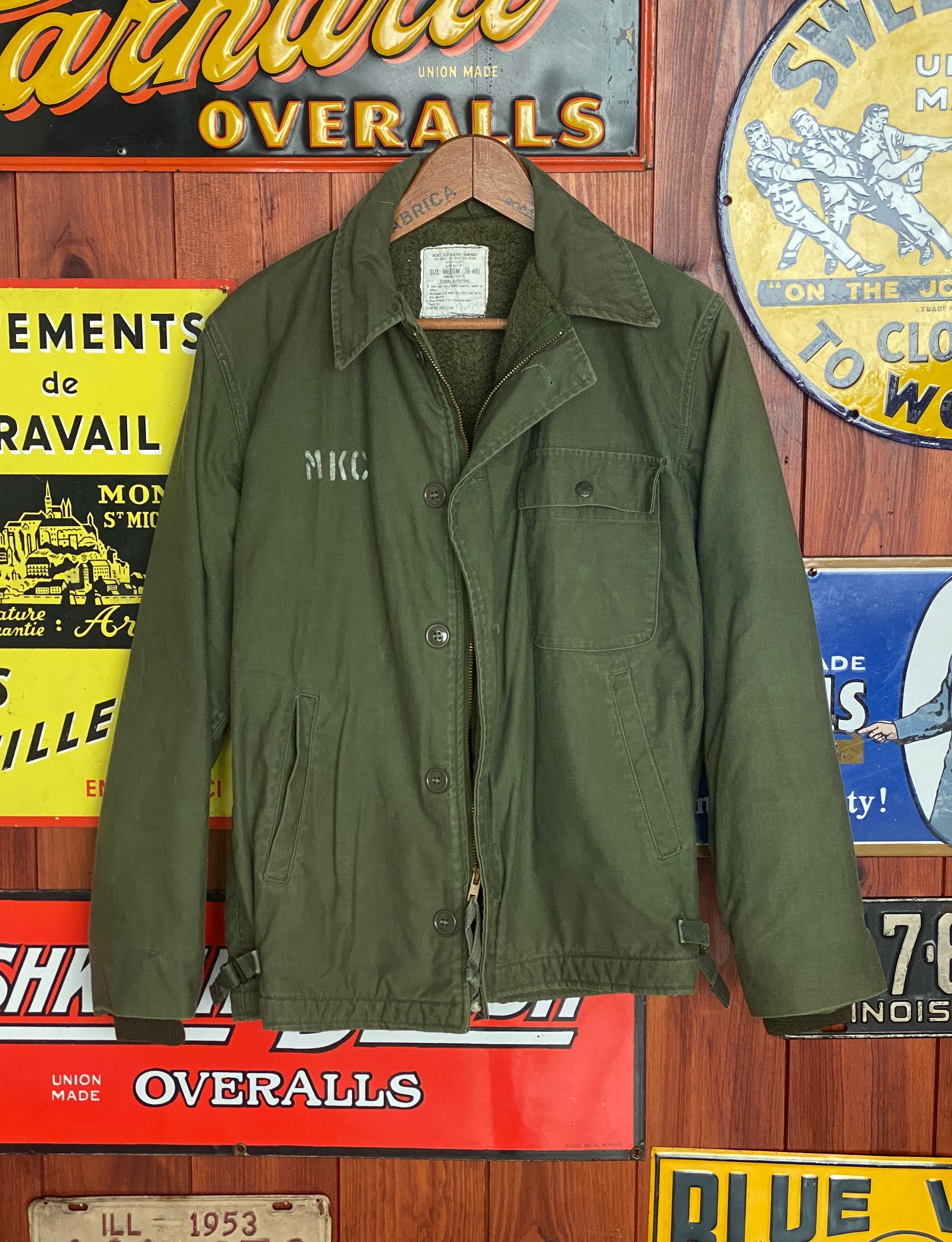 Vintage 1981 US Navy USN deck jacket with wool lining, size Medium.