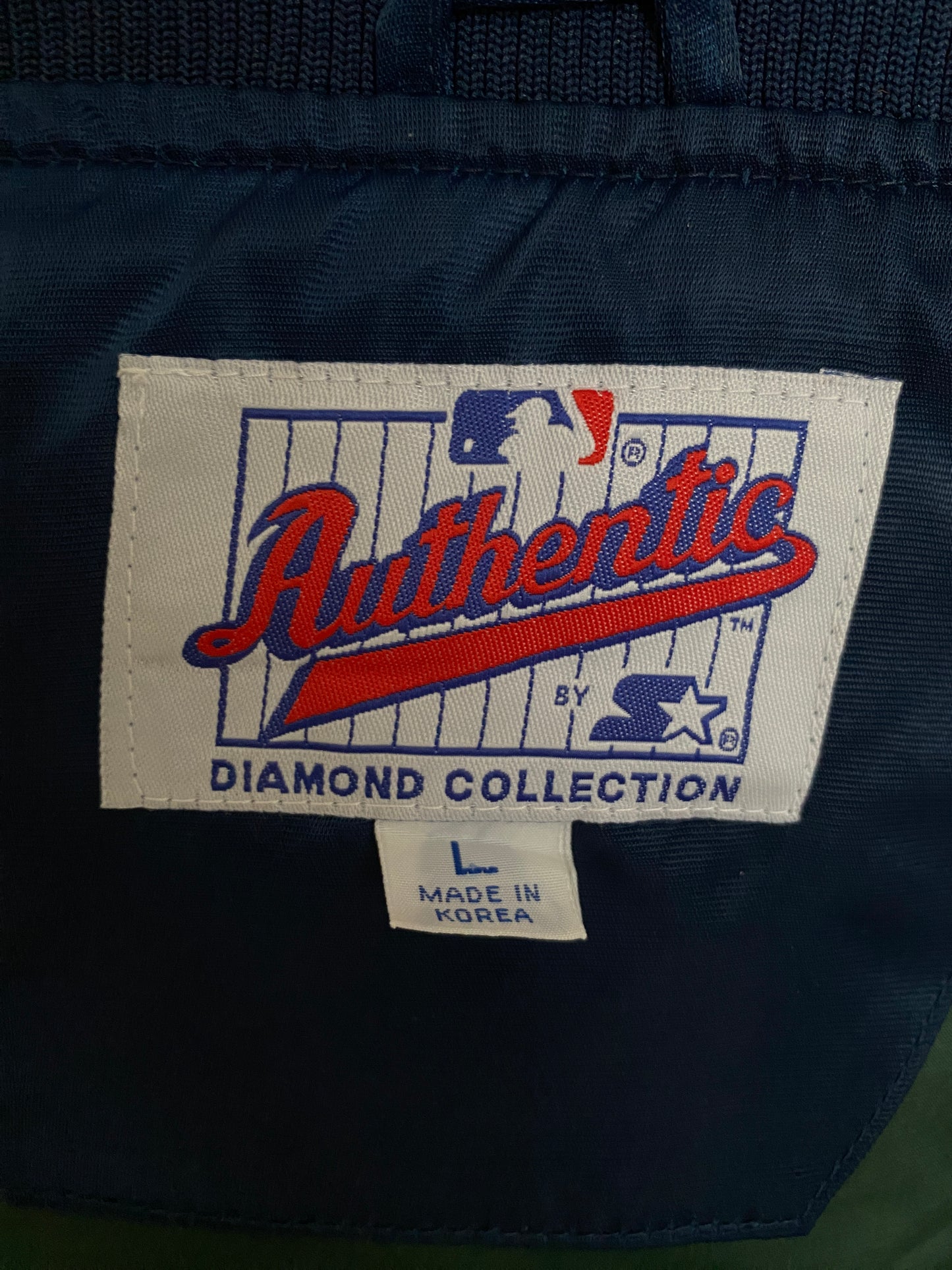 Vintage 1980s Milwaukee Brewers Starter satin jacket with team logo, size large