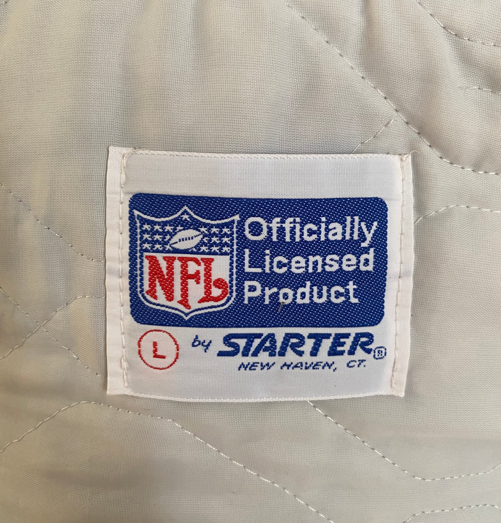 Vintage 1980s New England Patriots Starter satin jacket made in USA, size large.