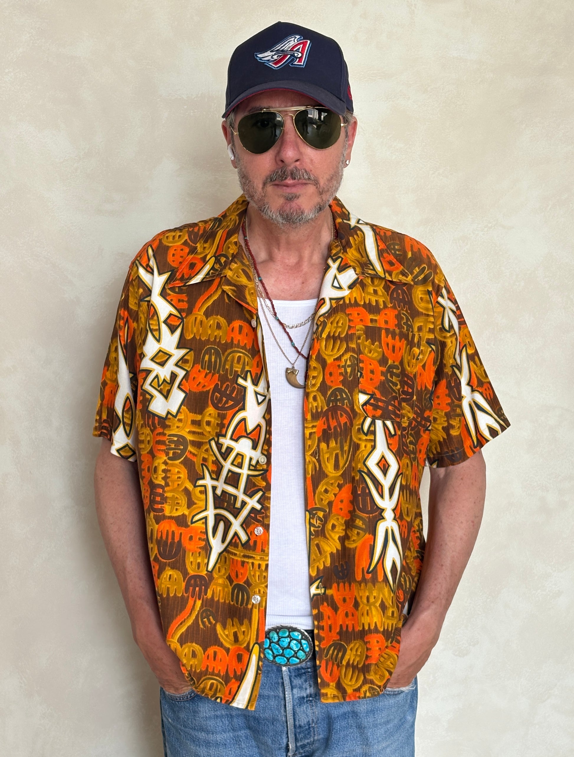 Vintage 1970s Hawaiian cotton shirt by Kauai with floral print, size XLarge.