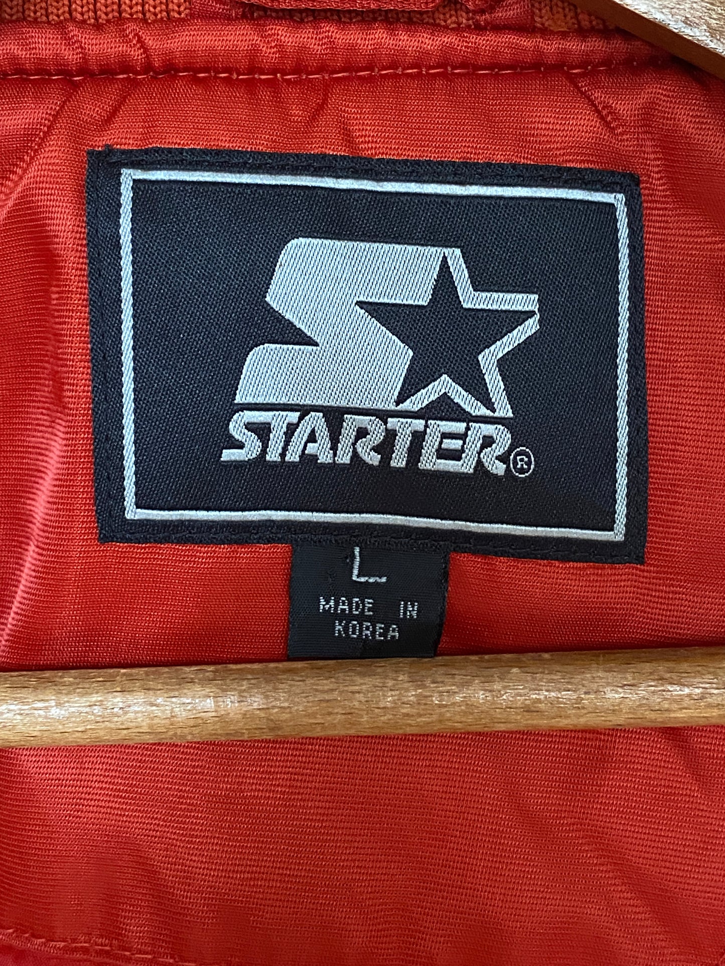 Vintage 1990s New York Starter satin jacket, classic sports style, size large.