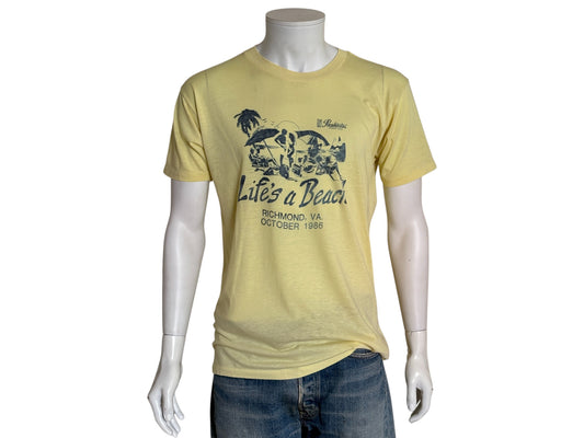 Vintage 1986 “Life’s a Beach” t-shirt from Richmond VA with retro beach scene and party vibe, size XL