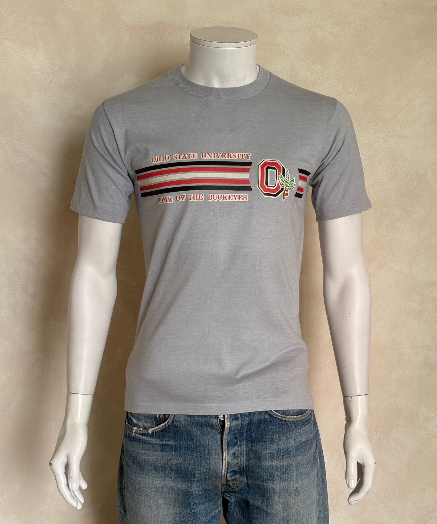 Vintage Ohio State University t-shirt with Buckeyes logo and athletic stripes, size medium