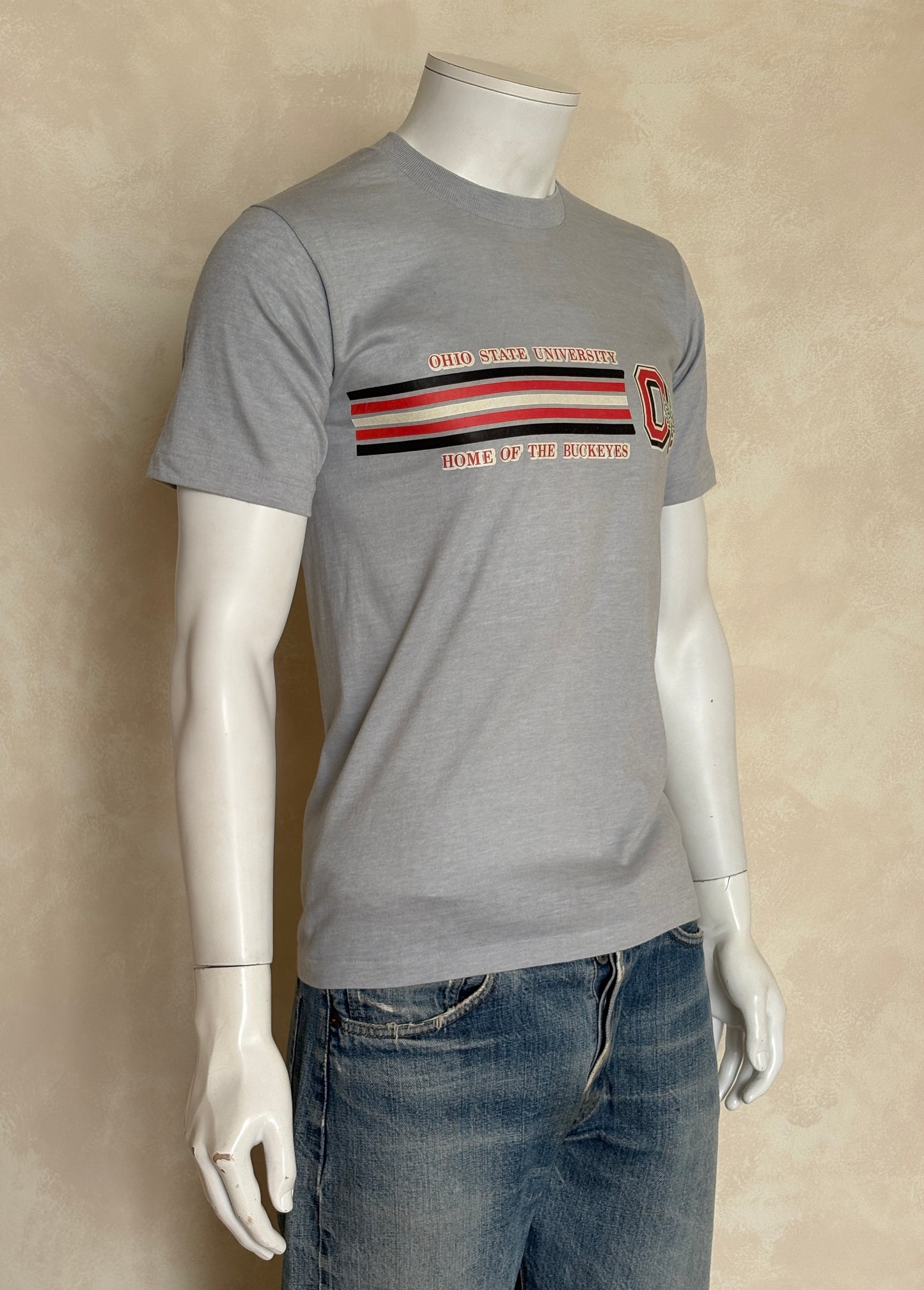 Vintage Ohio State University t-shirt with Buckeyes logo and athletic stripes, size medium