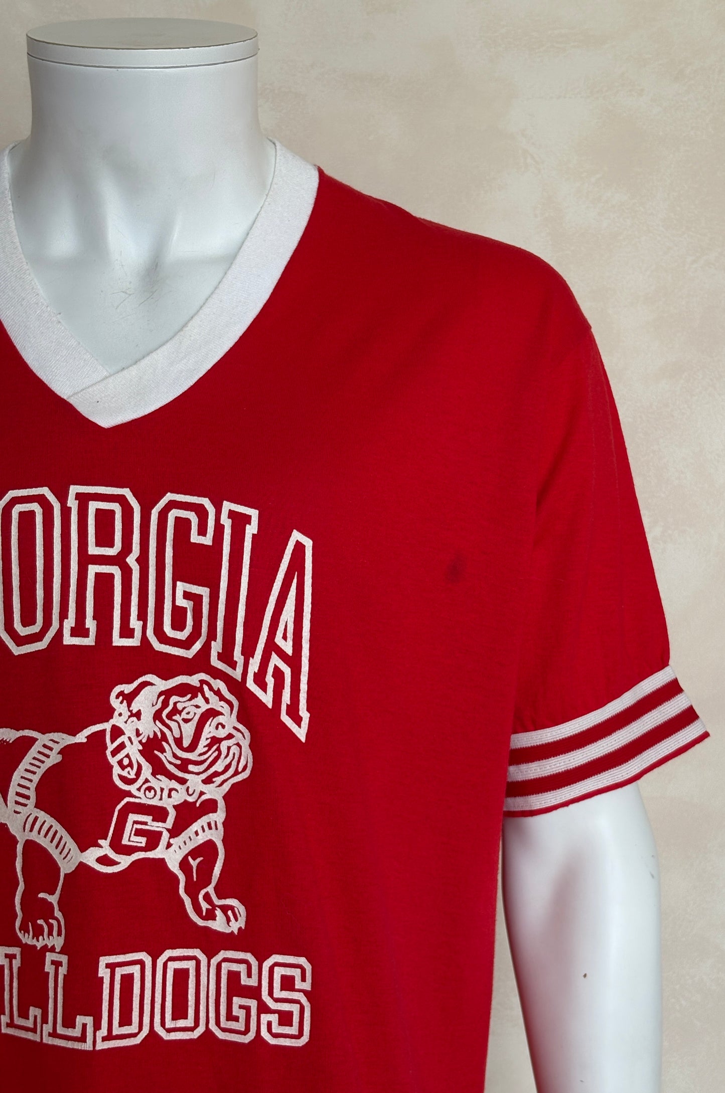 Vintage 1990s Georgia Bulldogs jersey t-shirt with bold collegiate style and classic mascot graphic, size XL