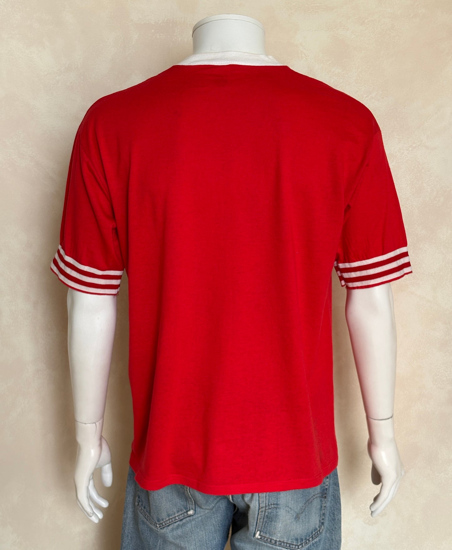 Vintage 1990s Georgia Bulldogs jersey t-shirt with bold collegiate style and classic mascot graphic, size XL