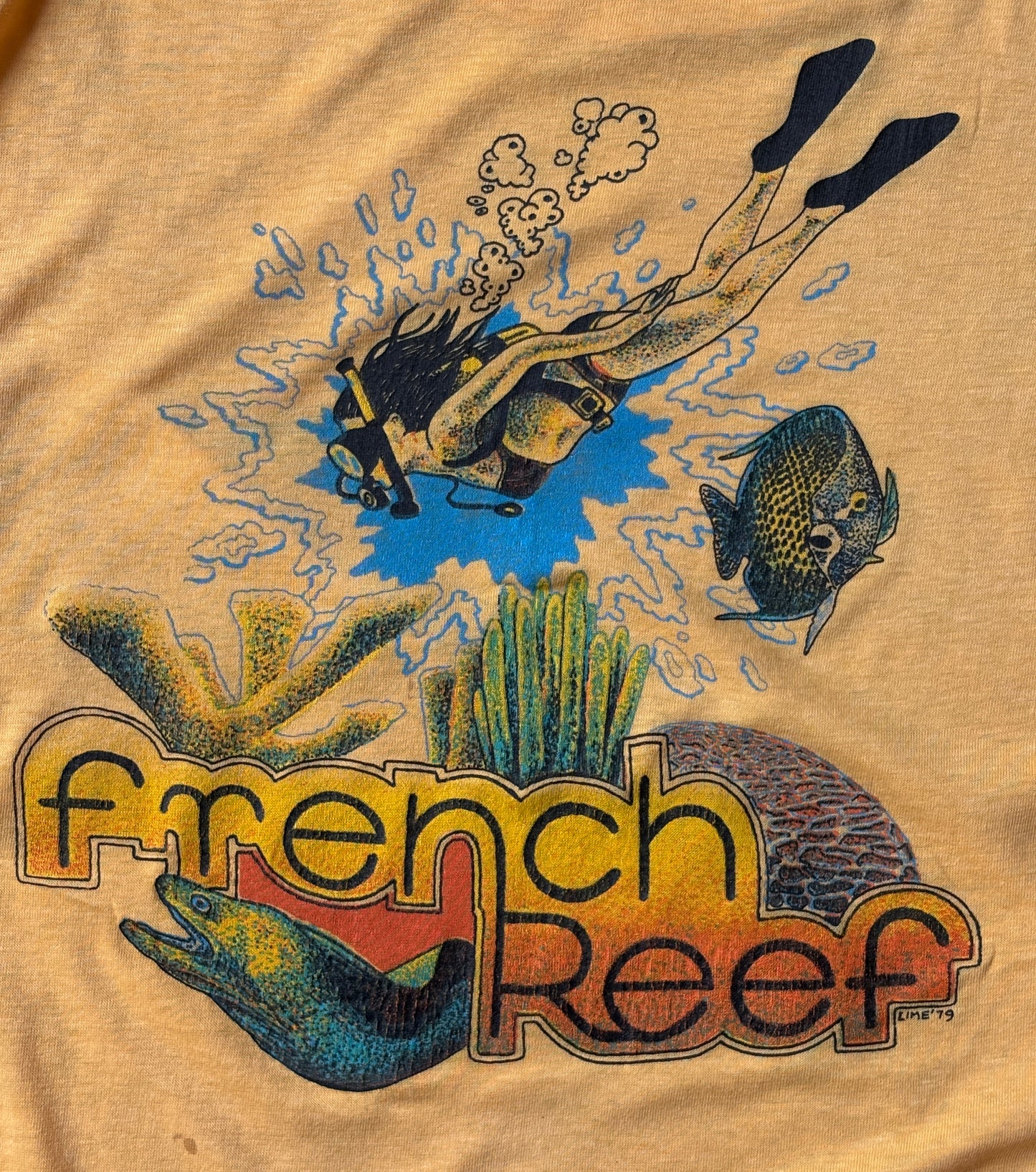 Vintage 1979 French Reef t-shirt with scuba diving graphic and tropical retro style, size large