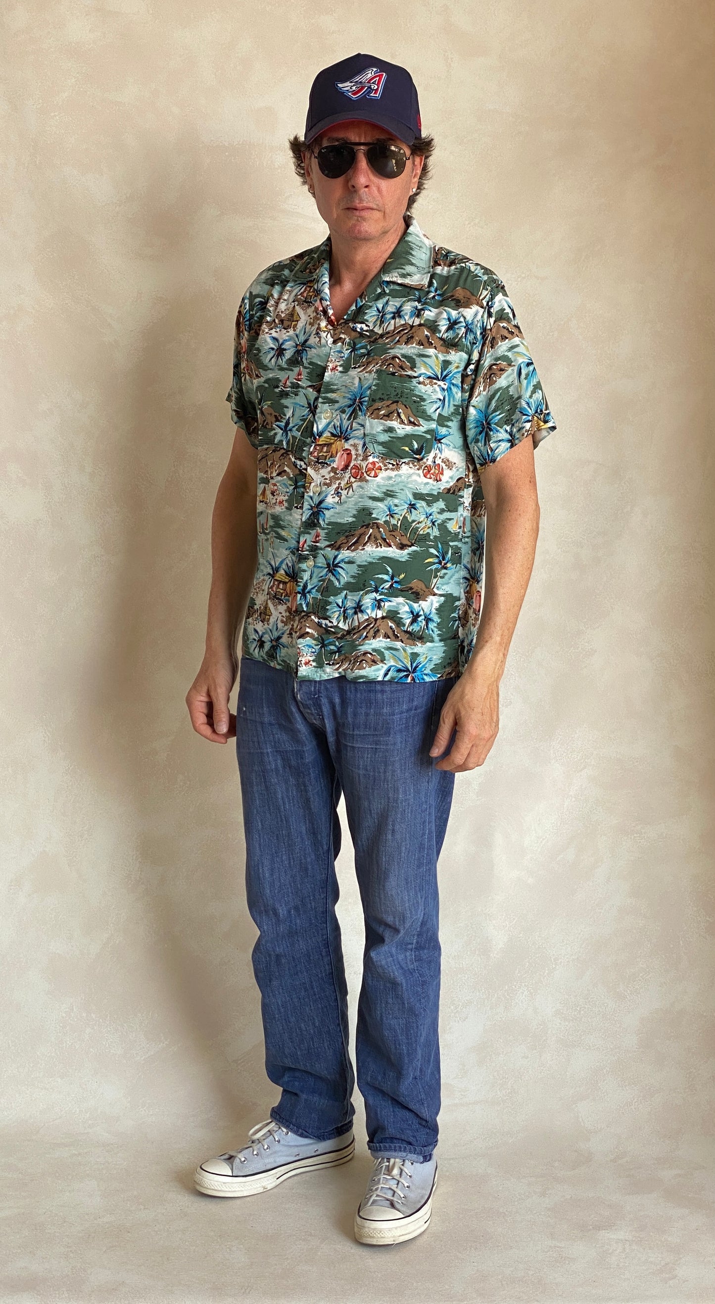 Vintage 1990s Aloha rayon Hawaiian shirt made in Japan with tropical print, size medium