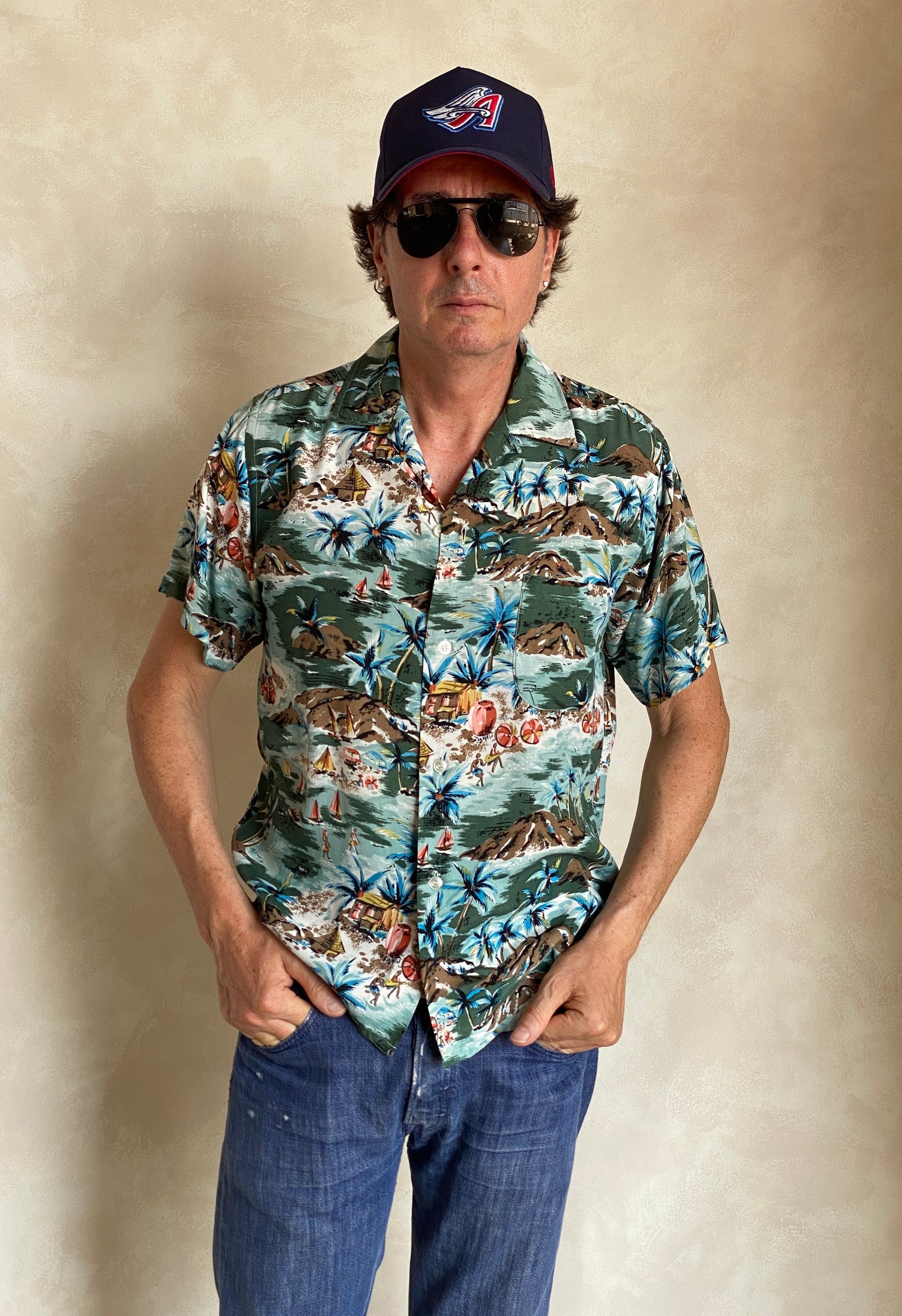 Vintage 1990s Aloha rayon Hawaiian shirt made in Japan with tropical print, size medium