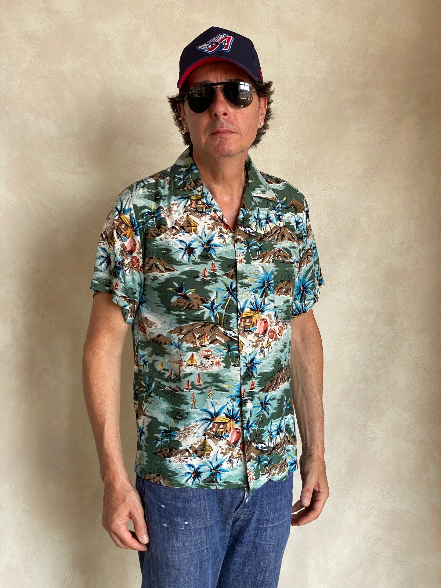 Vintage 1990s Aloha rayon Hawaiian shirt made in Japan with tropical print, size medium