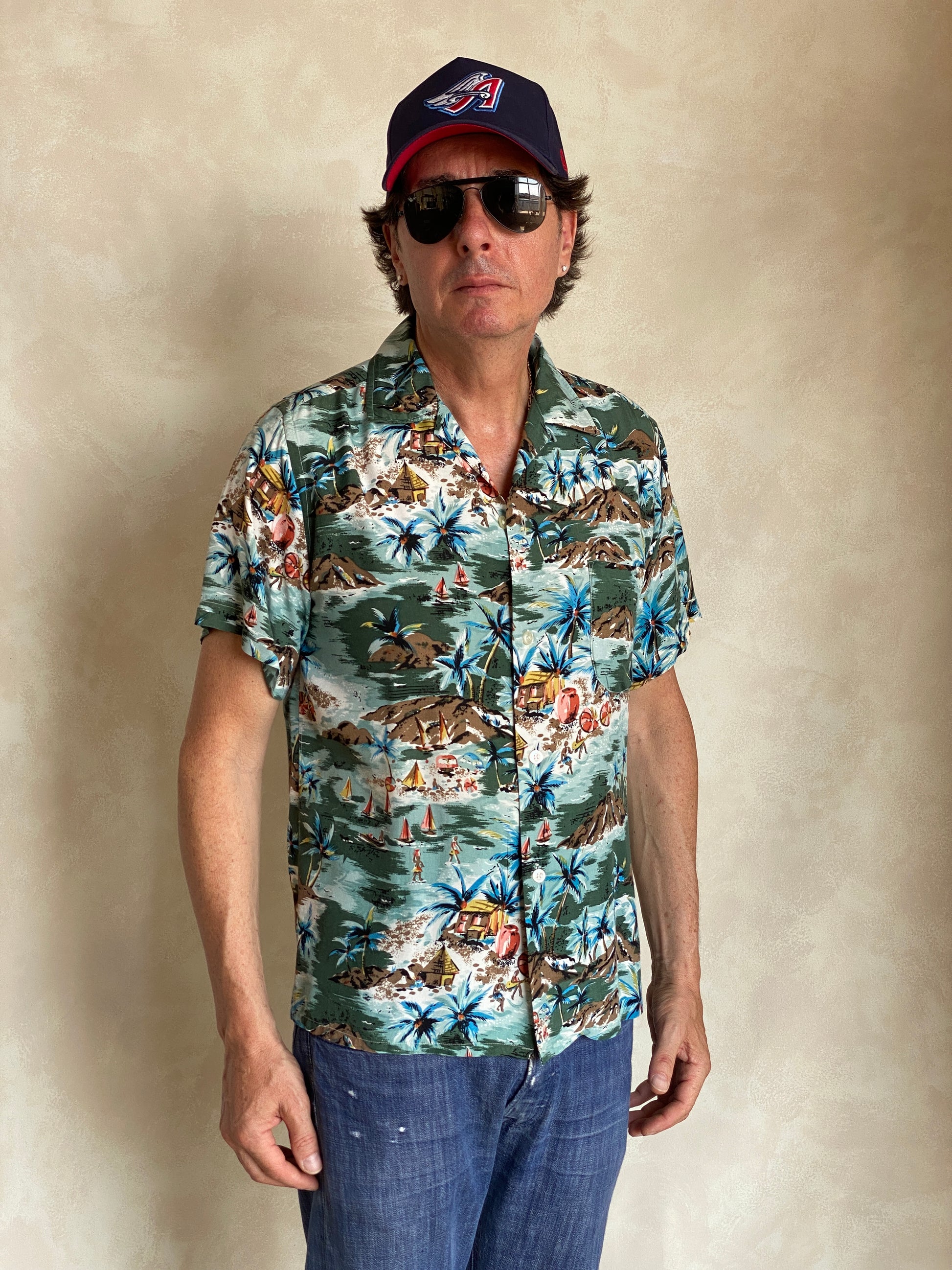 Vintage 1990s Aloha rayon Hawaiian shirt made in Japan with tropical print, size medium