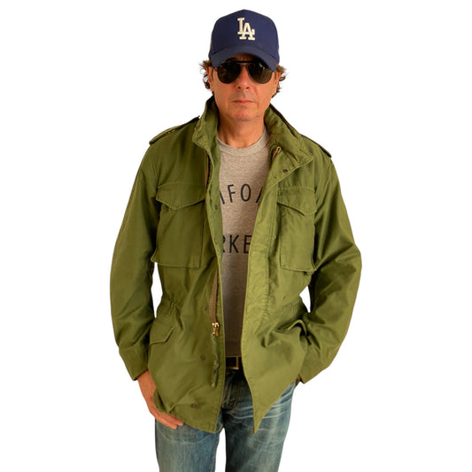 Authentic vintage US Army M-65 OG-107 field jacket, olive drab, size Medium Long.