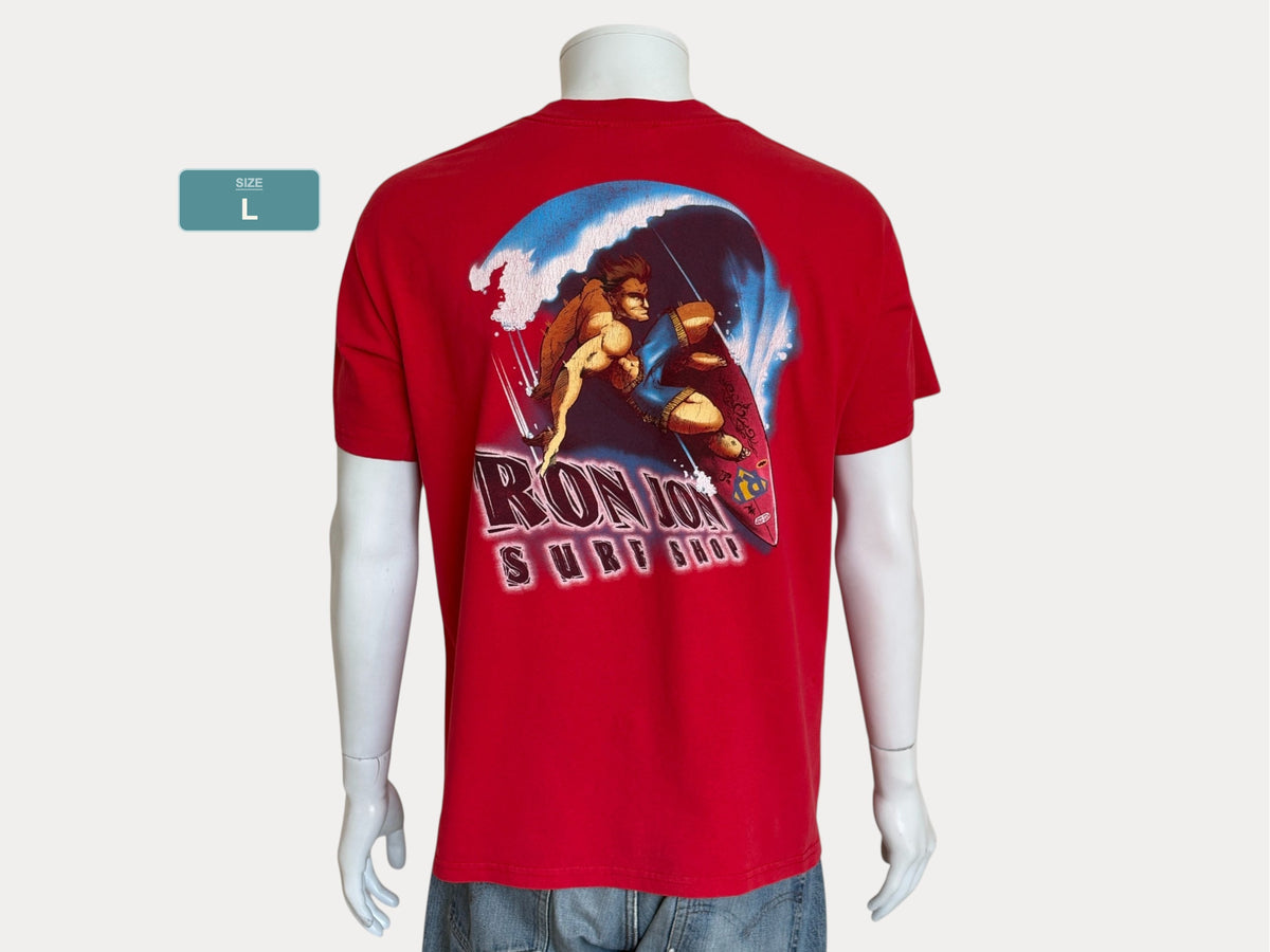 Vintage Ron Jon Surf Shop tee – bold comic-style surfer graphic with pure 90s beach energy. Large-AJ357 Studio