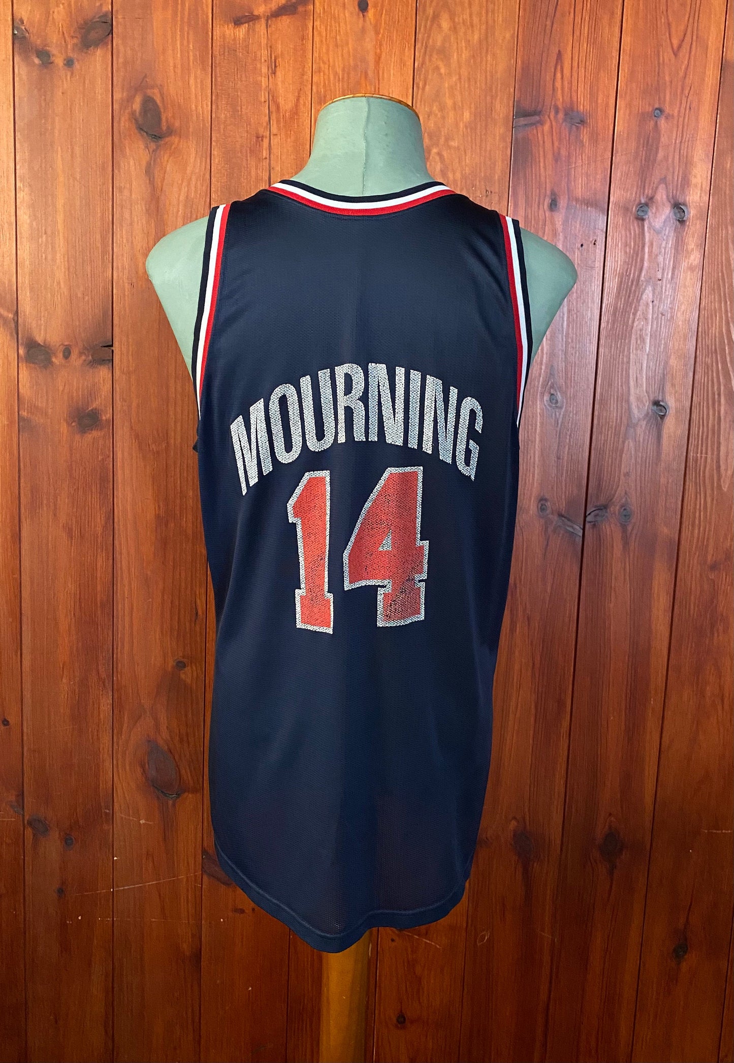 Vintage distressed 90s USA Team Champion NBA jersey with player Mourning #14, size 48 - front view.